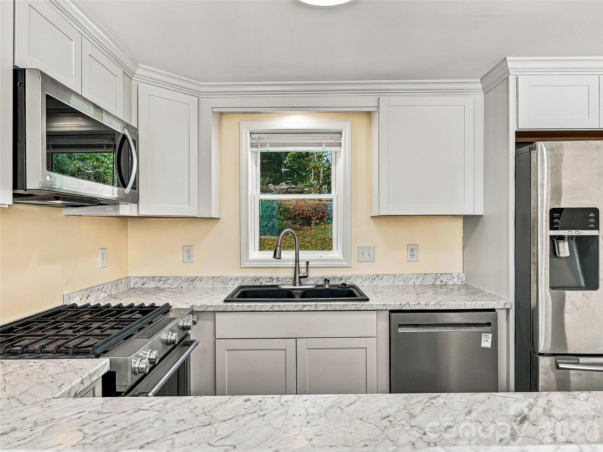 apartment kitchen - gas stove, microwave, dishwasher - 33 Phipps Street, Weaverville