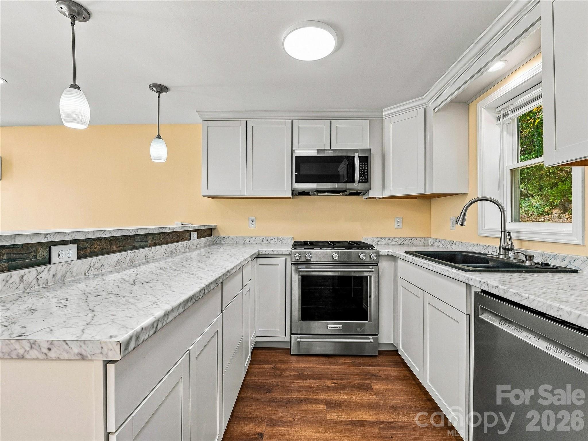 apartment kitchen - gas stove, microwave, dishwasher - 33 Phipps Street, Weaverville