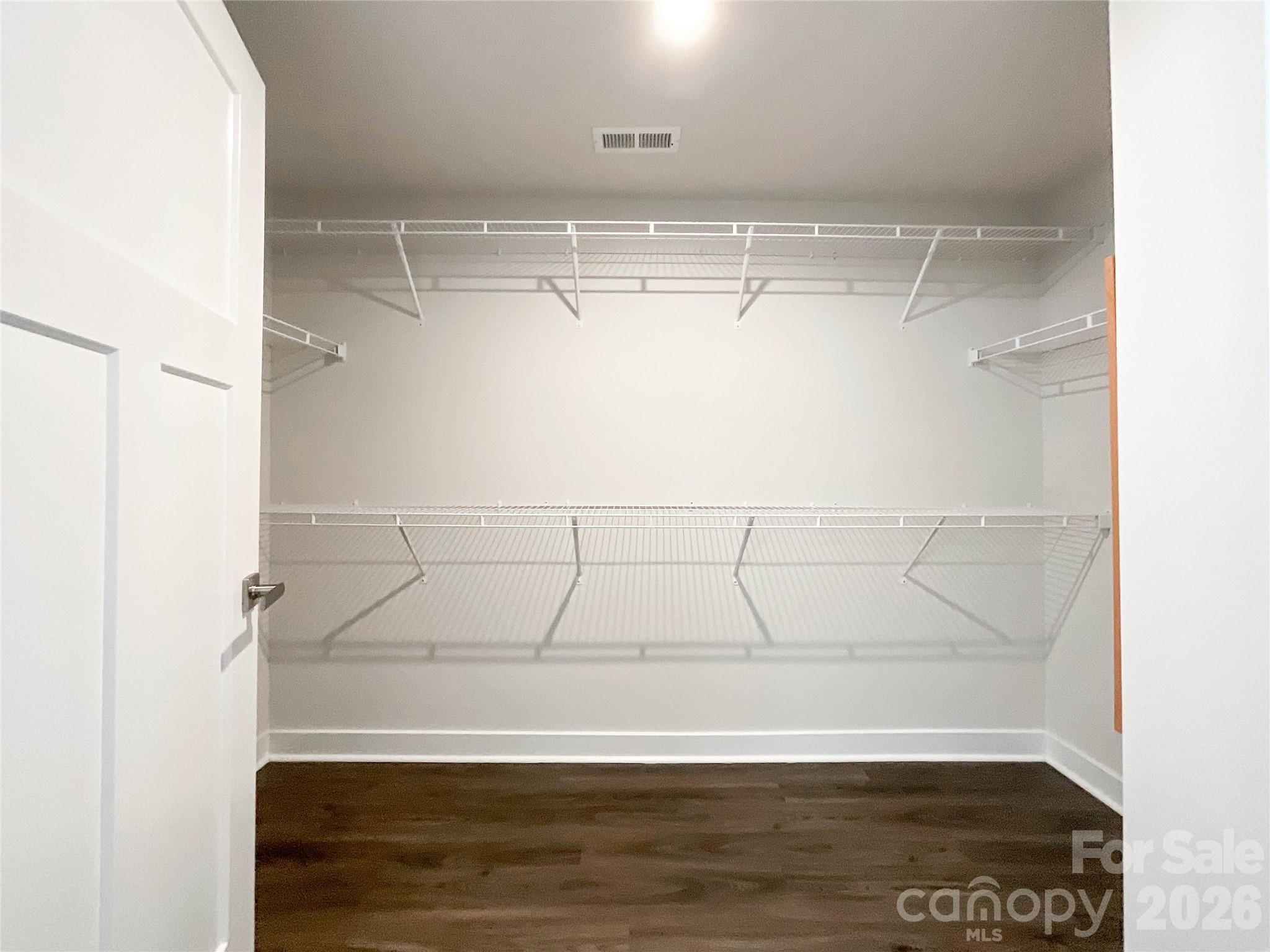 Primary Walk In Closet-Storage Shelving - 5091 Summer Surprise Lane, Charlotte