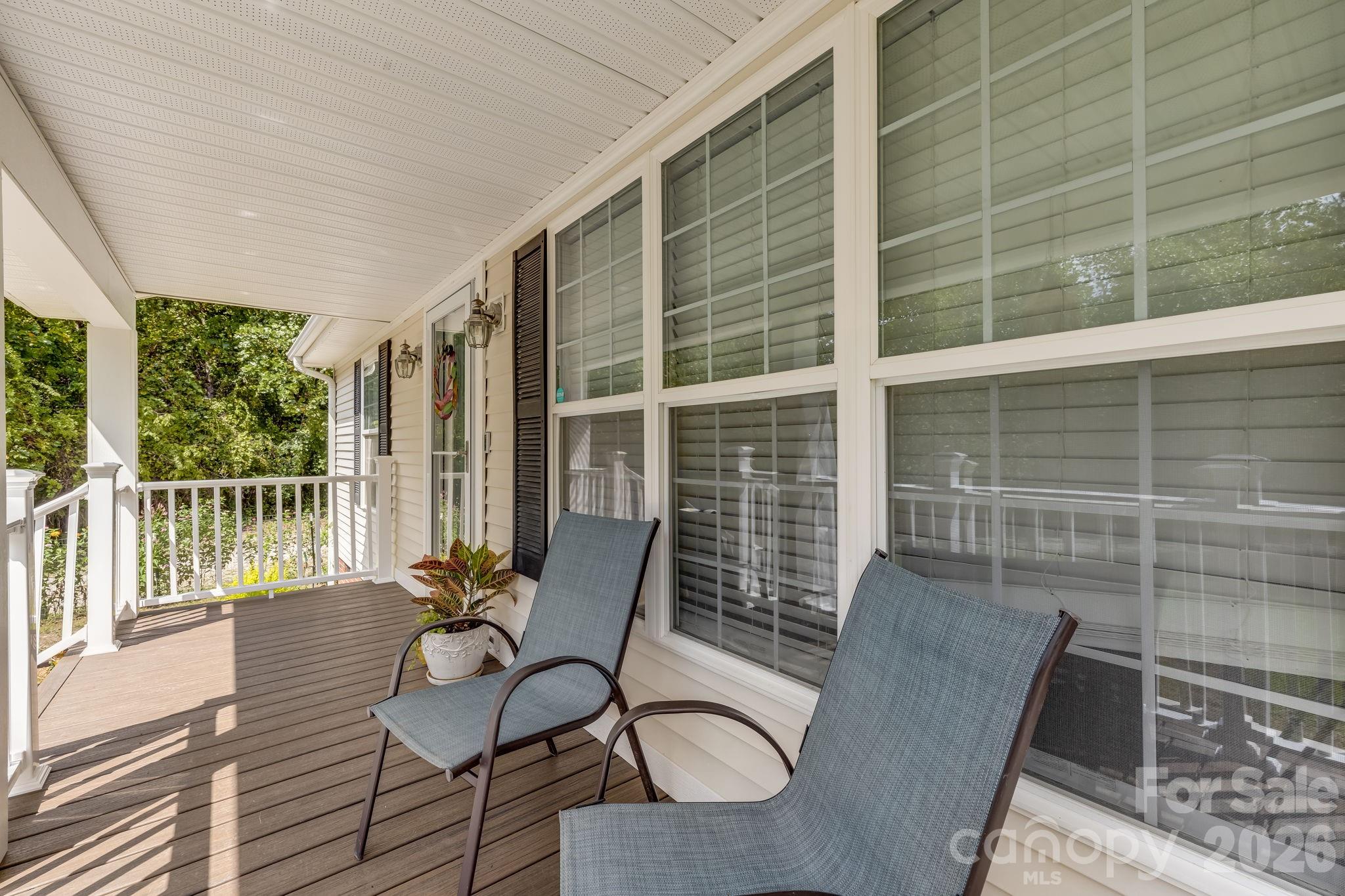 Add your favorite rocking chairs and stay awhile. - 710 Stoney Mountain Road, Hendersonville