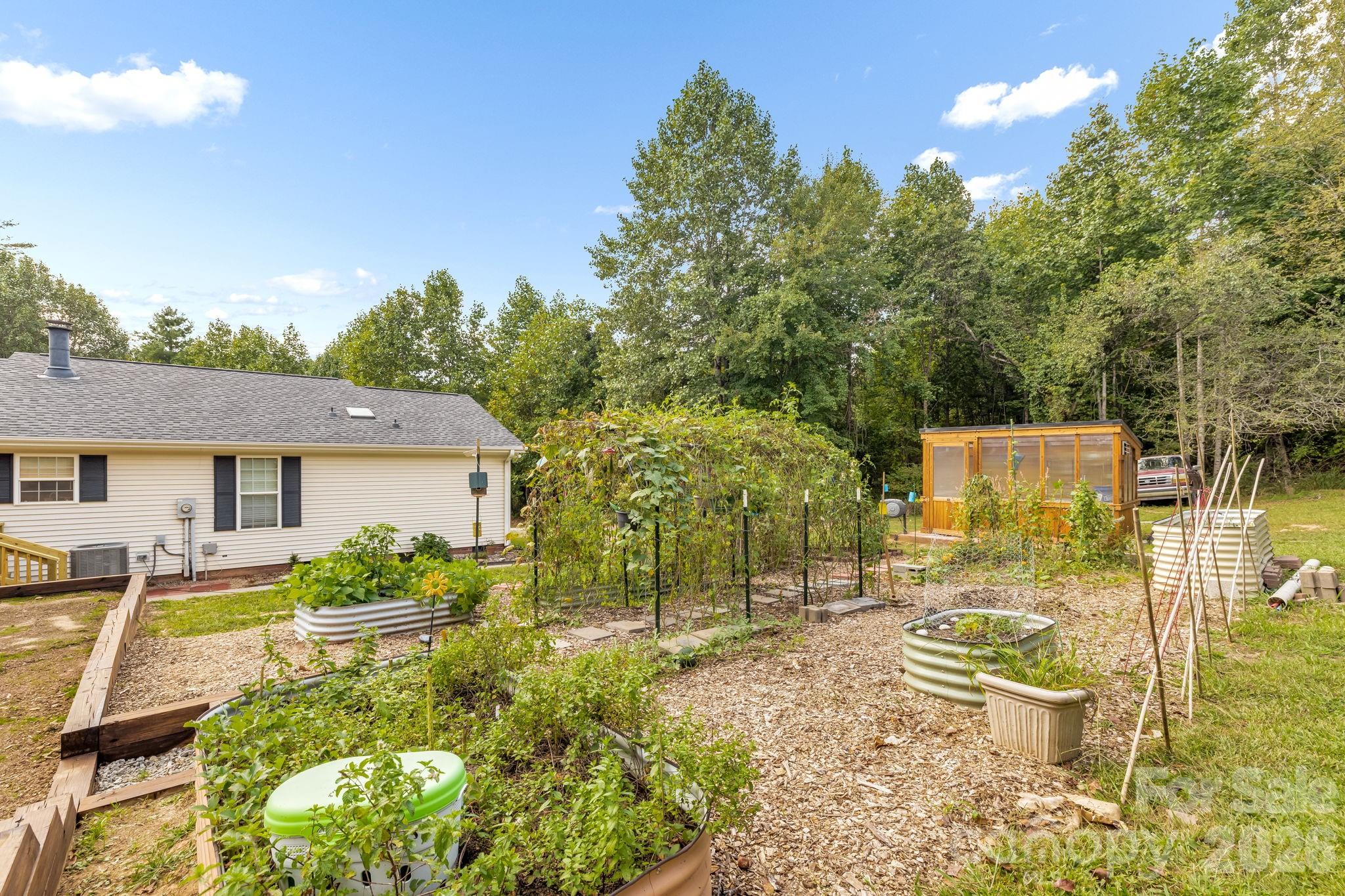 Room to play, garden, or simply enjoy being outside. - 710 Stoney Mountain Road, Hendersonville