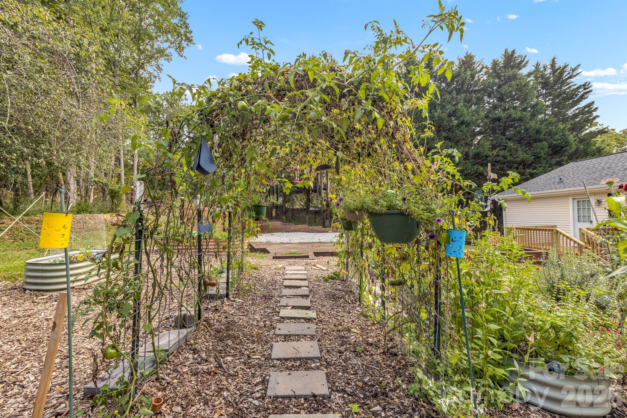 Spend a little time among the established gardens. - 710 Stoney Mountain Road, Hendersonville