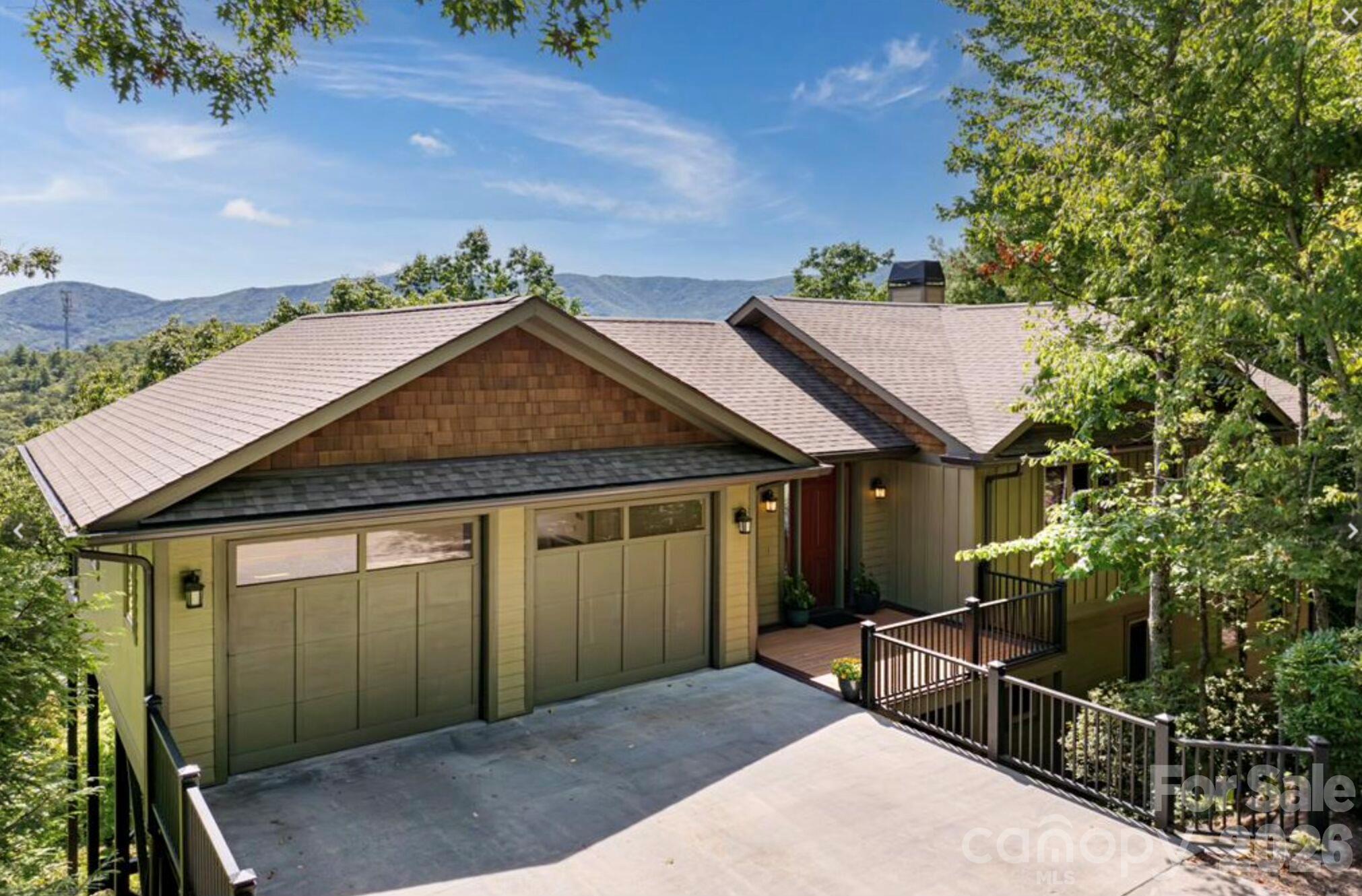 Perfectly level driveway with 2 car garage all on the main level. - 351 Chapel Road, Black Mountain