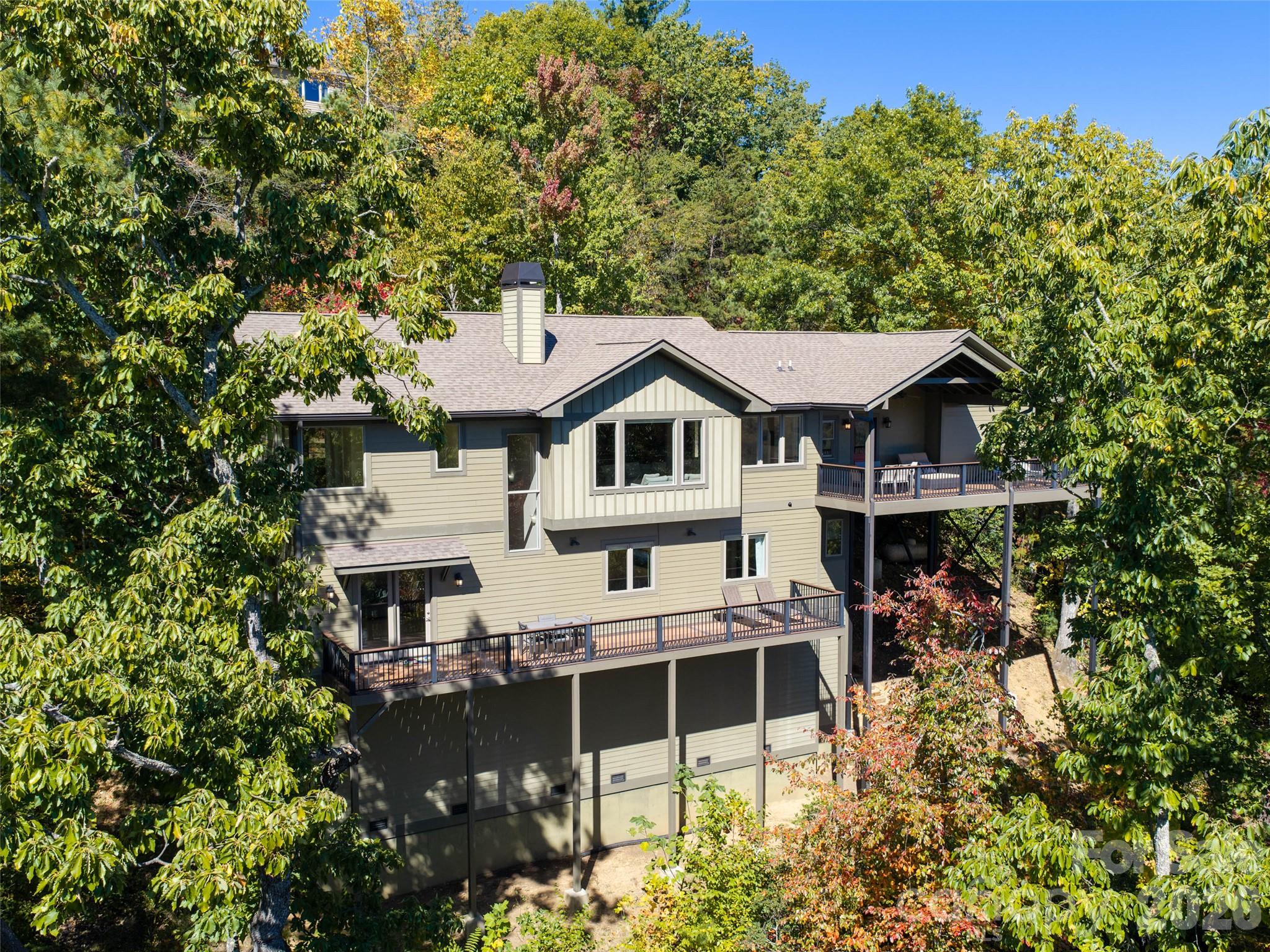 Beautiful Arts and Crafts 2 level home offering year round long range mountain views just minutes to downtown Black Mountain. - 351 Chapel Road, Black Mountain