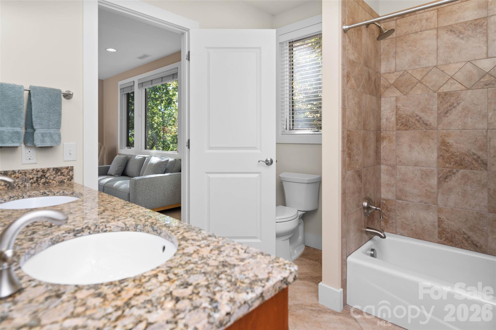 Lower level jack and Jill full bath between the family room and bedroom #2 - 351 Chapel Road, Black Mountain