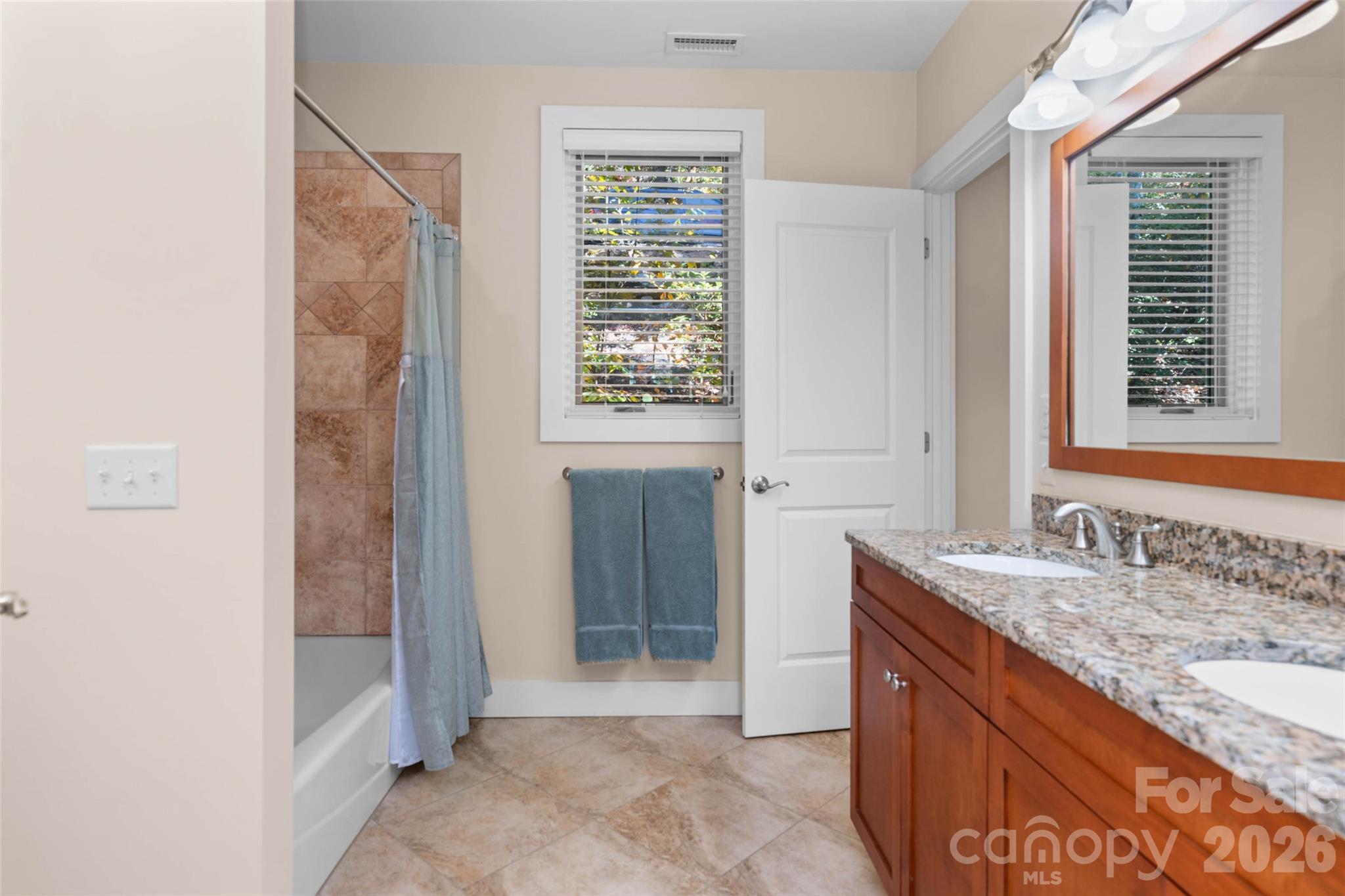 Lower level jack and Jill full bath between the family room and bedroom #2 - 351 Chapel Road, Black Mountain