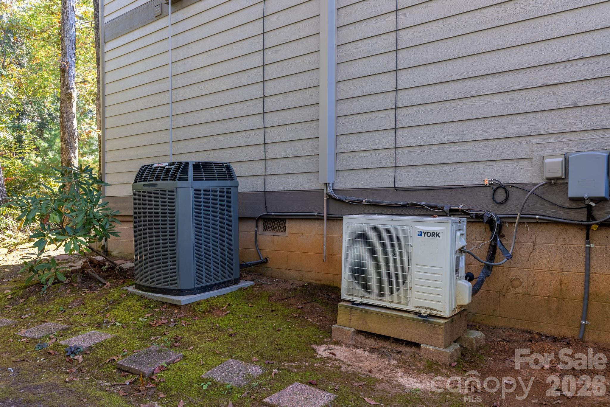 Exterior HVAC equipment includes a large central air-conditioning unit to the left - 524 Three Mile Knob Road, Pisgah Forest