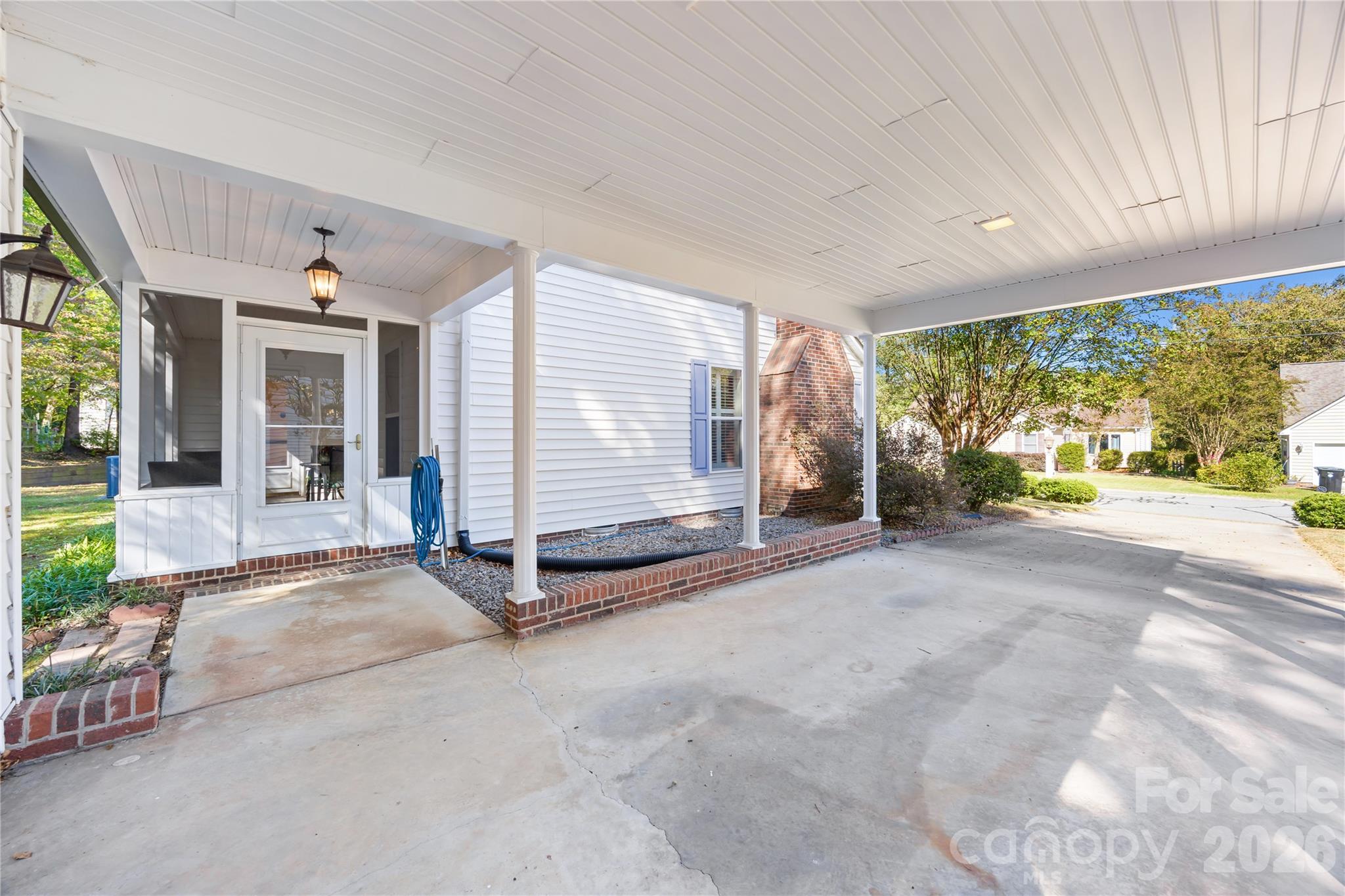 Carport entrance to Sunroom - 477 Birchwood Trail NE, Concord