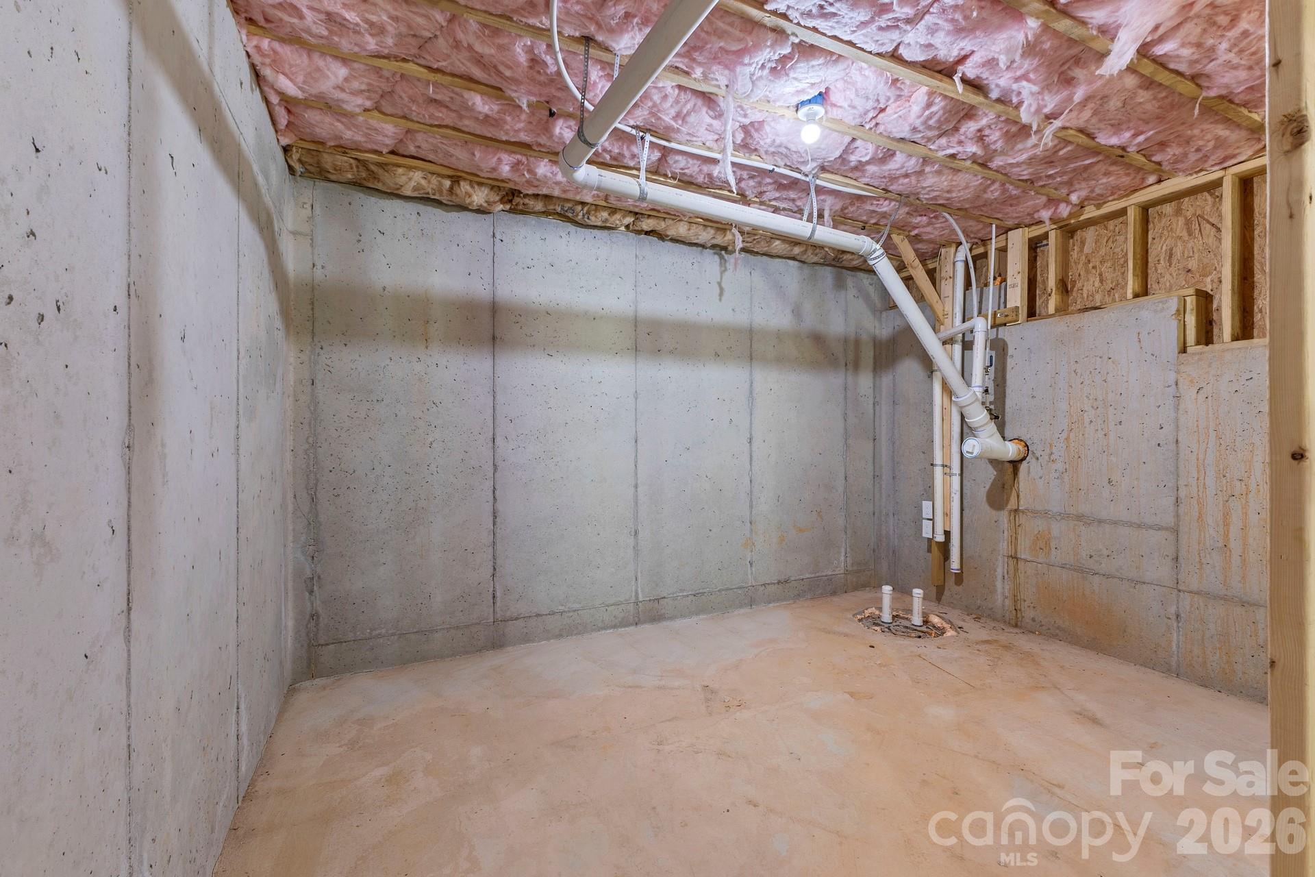 Framed unfinished gym located in the basement. - 3741 Stanley Creek Drive, Mount Holly