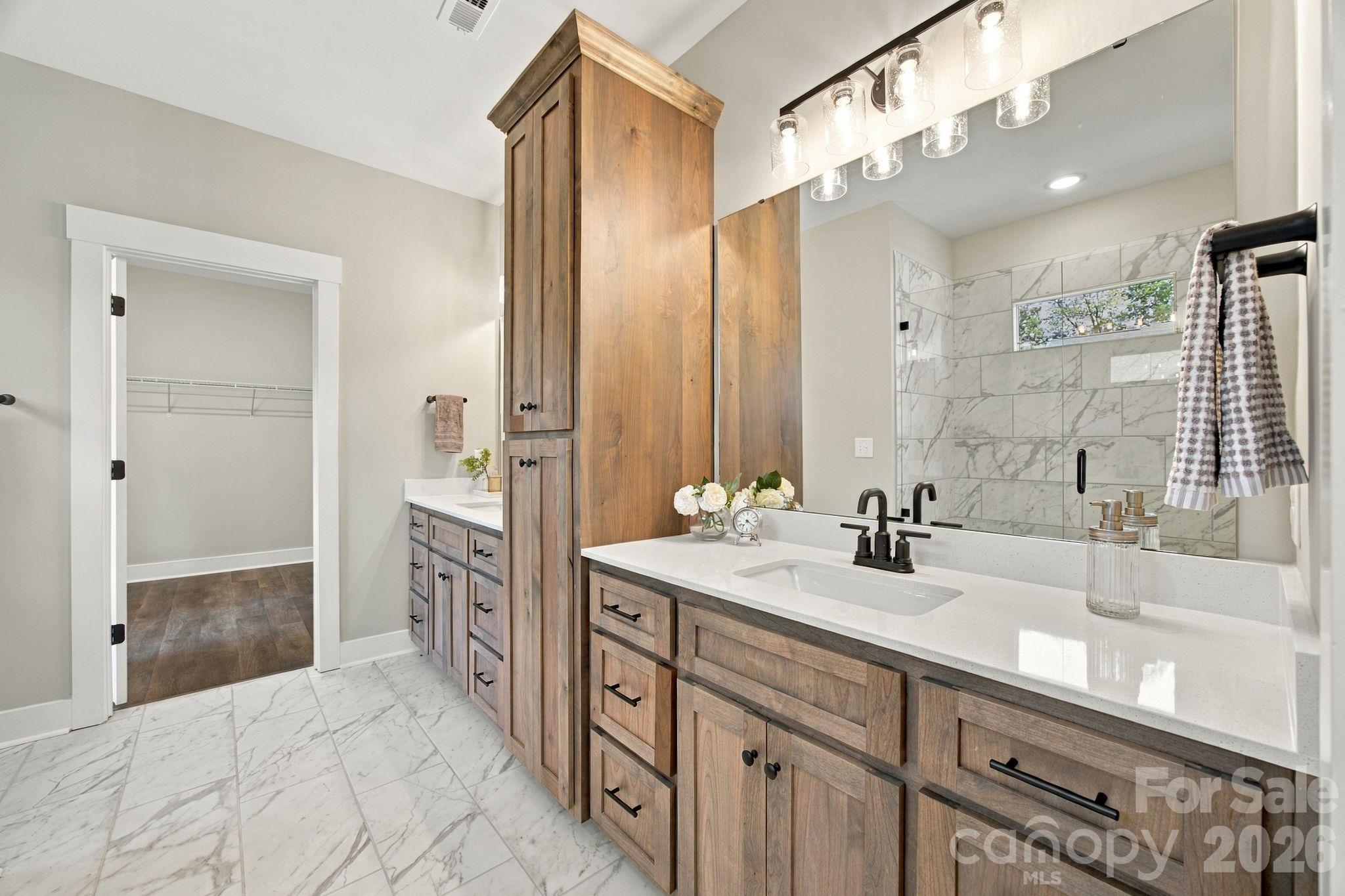 Primary Bathroom with Linen Tower and two vanities120 S Crawford StMonroe, NC 28112 - 120 S Crawford Street, Monroe