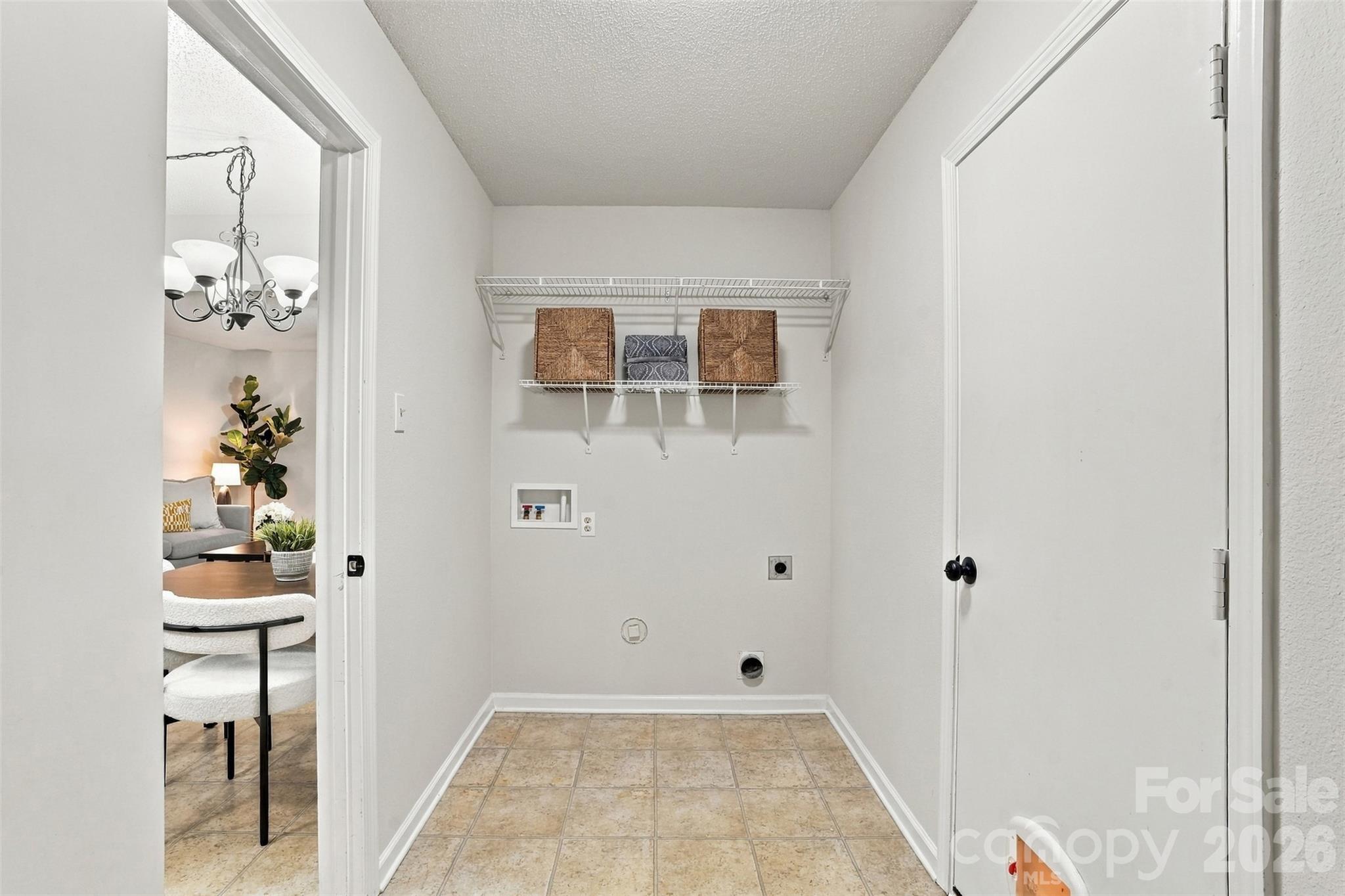 Laundry room between garage and kitchen. - 1901 Beckwith Lane, Waxhaw