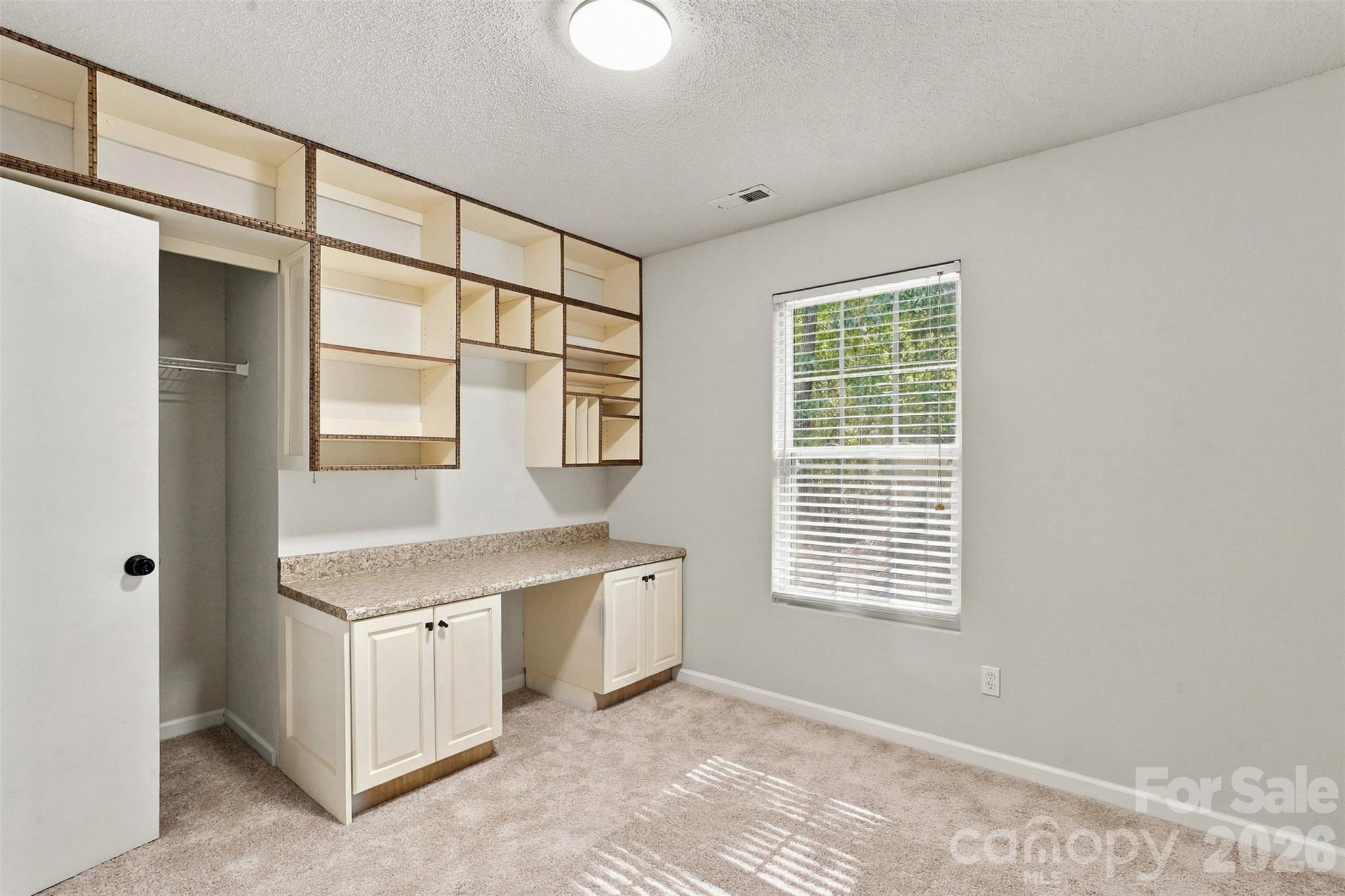 One of two secondary bedrooms.  Home office or craft room. - 1901 Beckwith Lane, Waxhaw