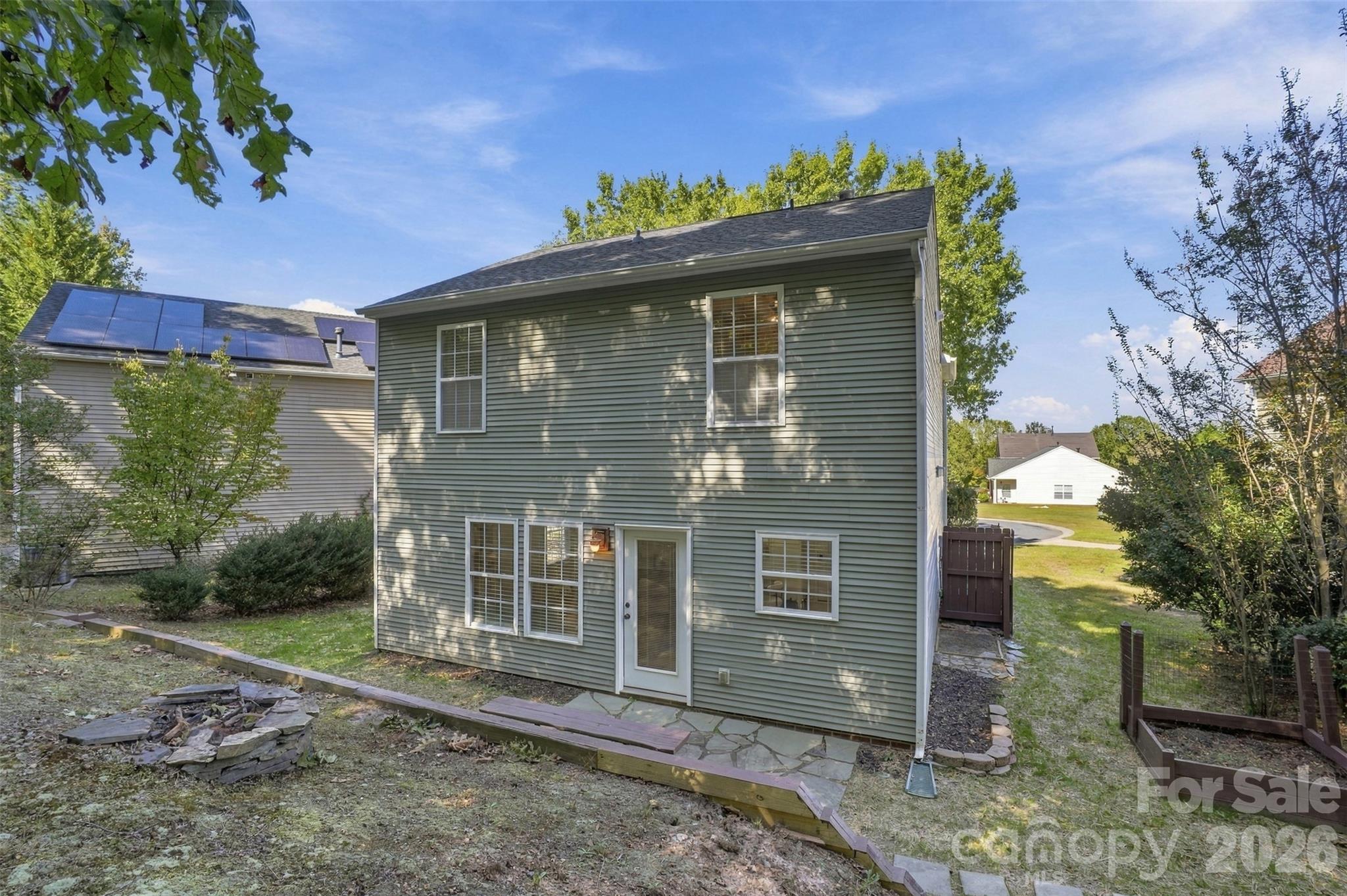 Privacy fence to hide trash cans.  Raised garden bed. - 1901 Beckwith Lane, Waxhaw
