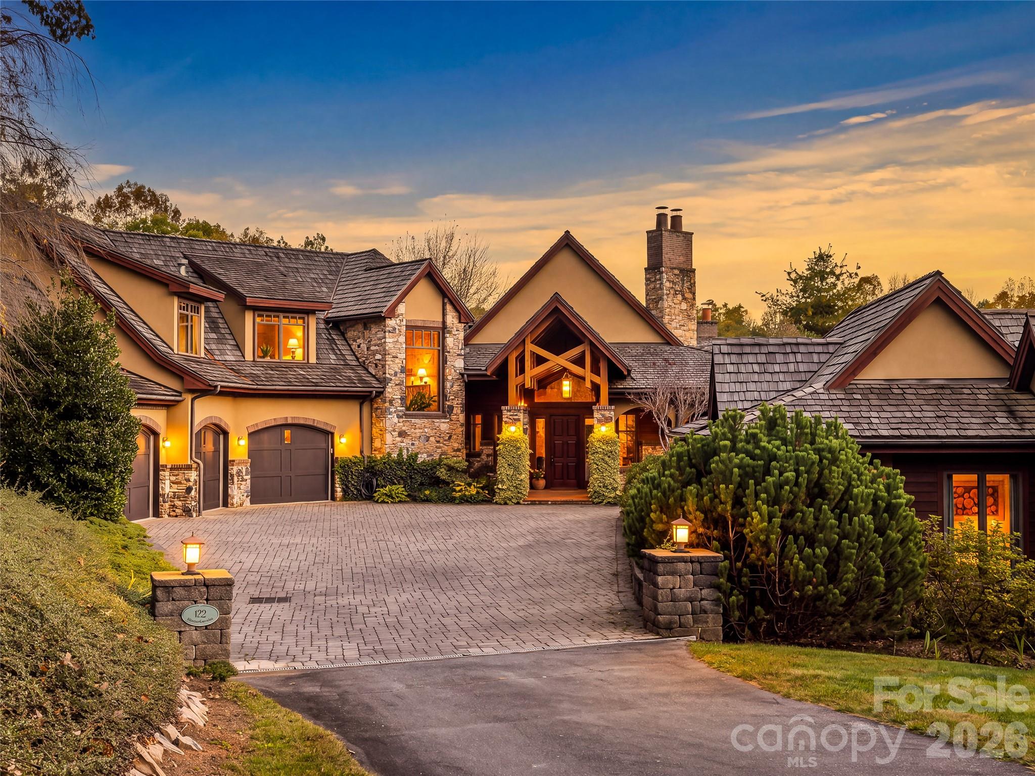 Welcoming motor court at the custom built luxury residence. - 422 Heart Stone Way, Burnsville