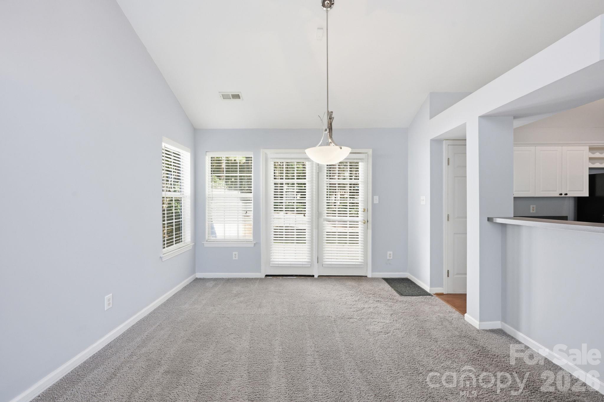 Easily move from the Kitchen to your Dining Room! - 4000 Huntmeadow Drive, Charlotte