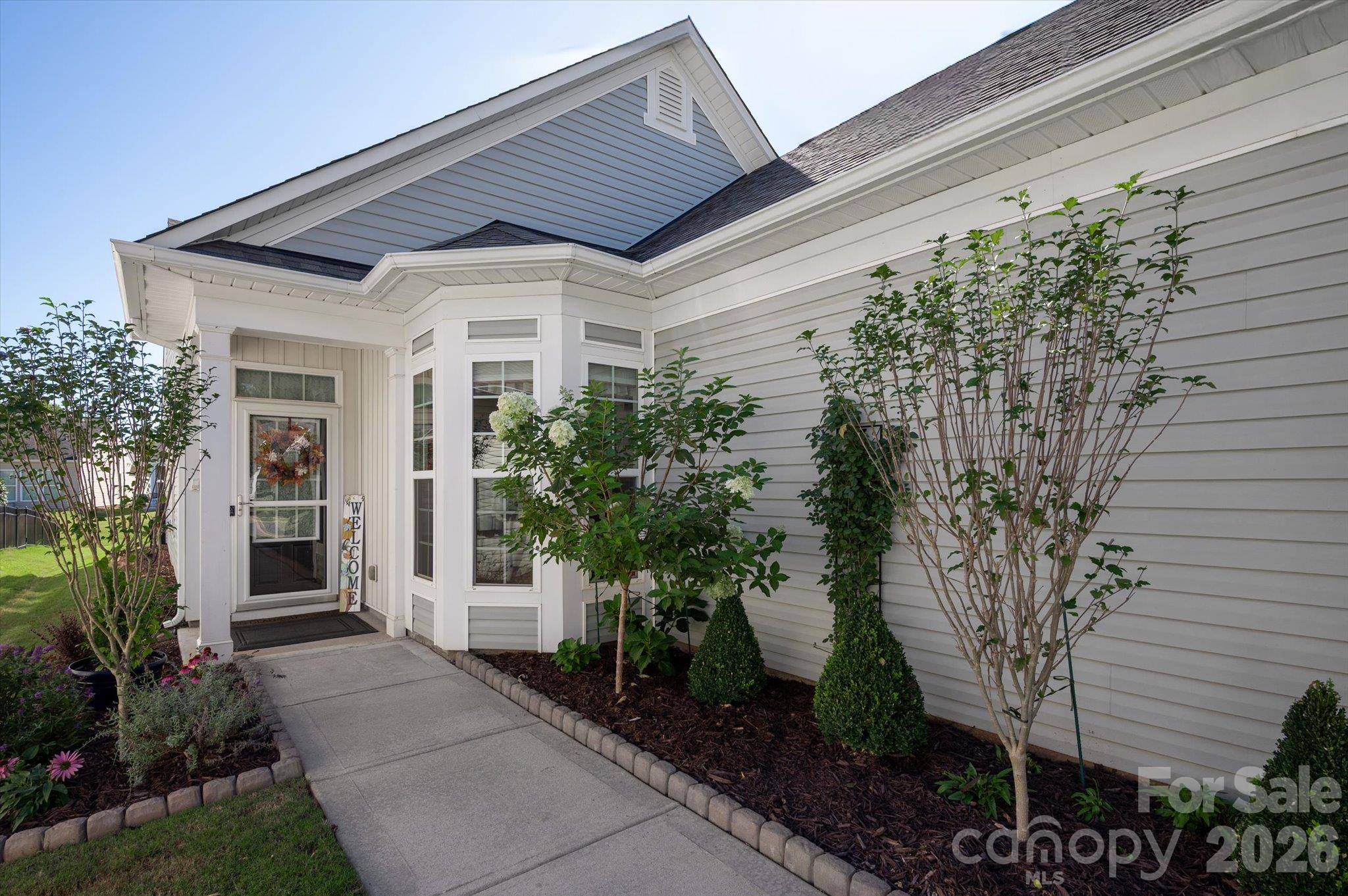 Professionally landscaped, cobblestone pavers, and drip line irrigation system! - 23121 Whimbrel Circle, Indian Land
