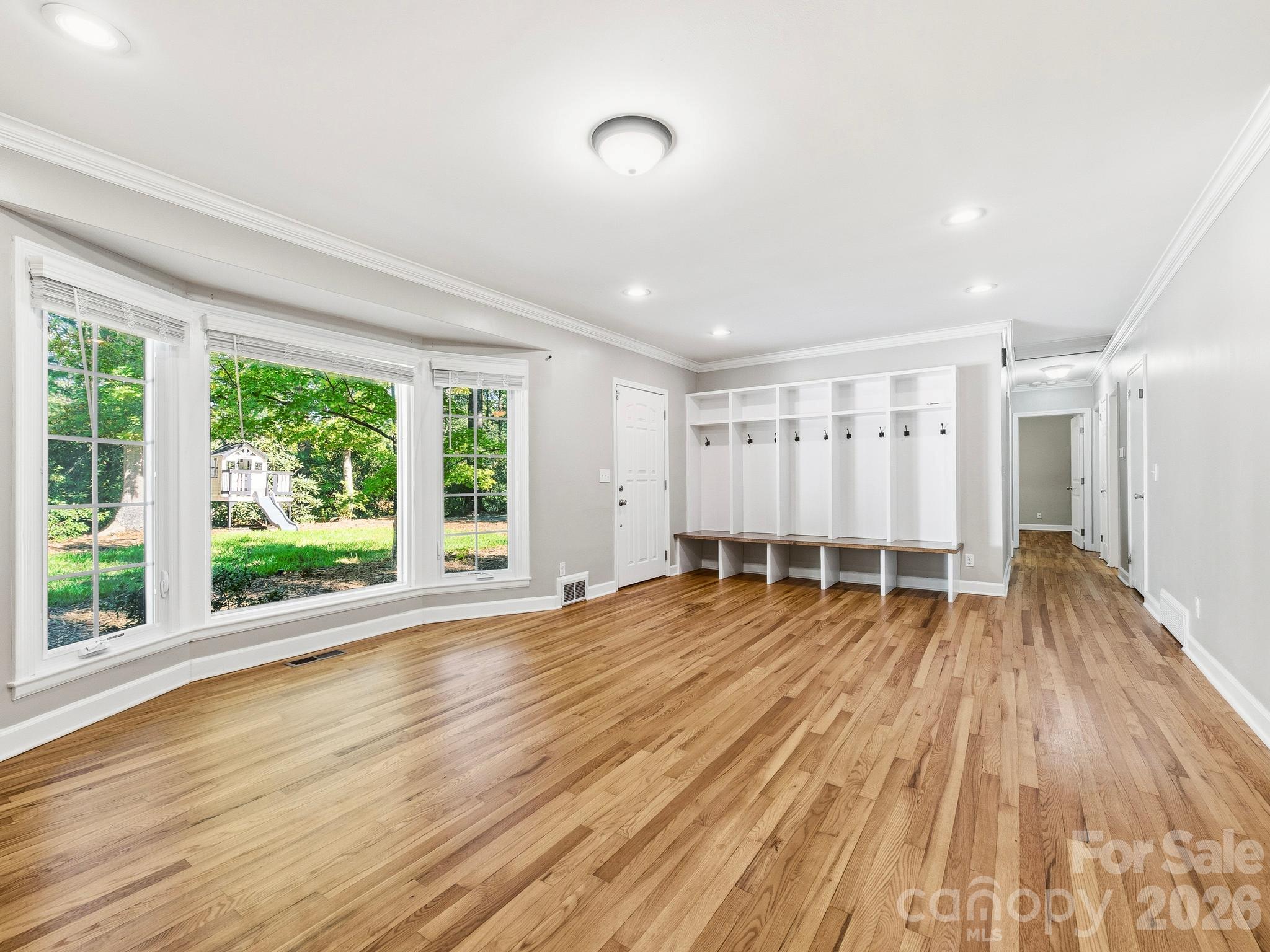 Living Room features a bay window, built in cubbies by the front door and a fireplace. - 175 Mimosa Road, Columbus