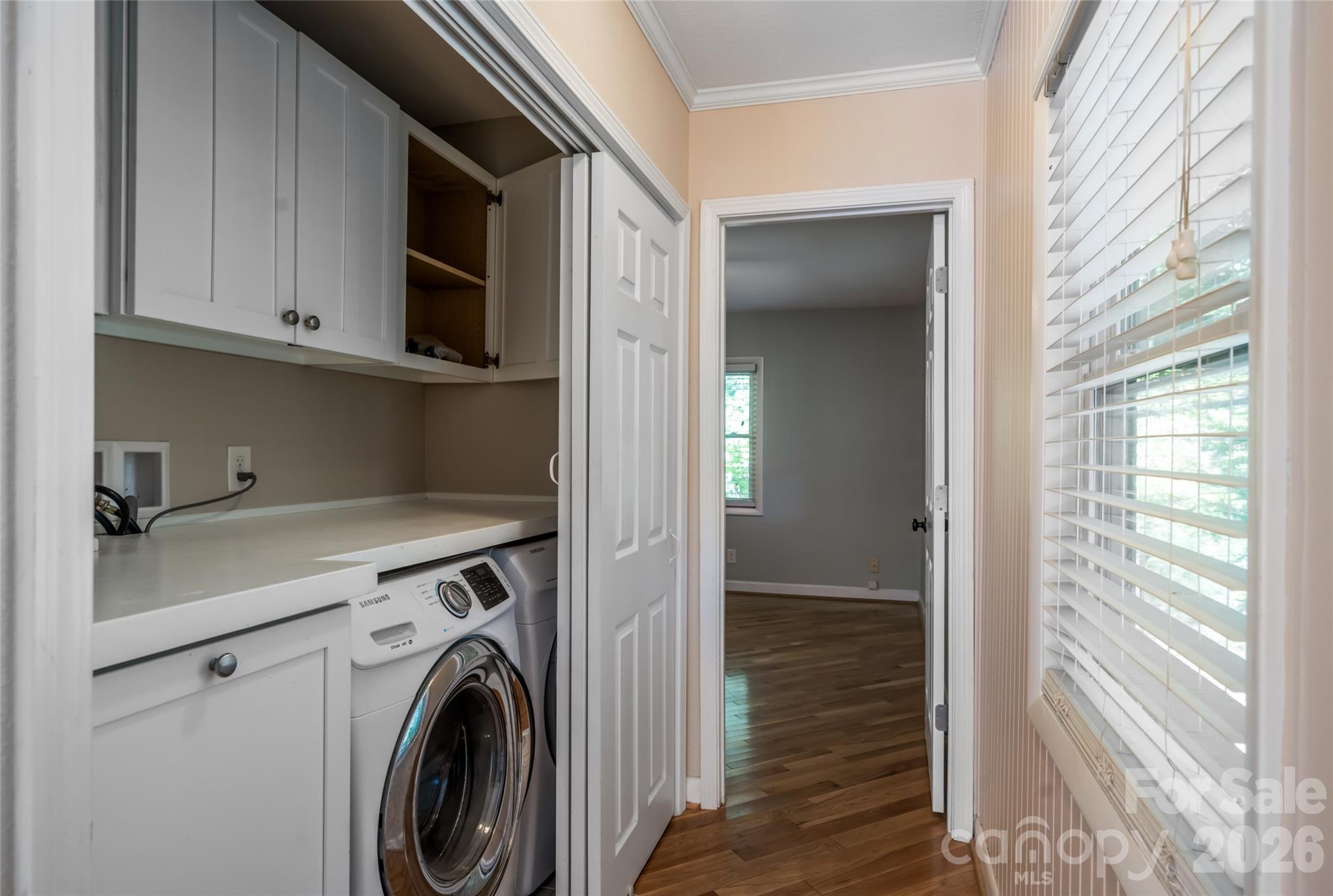Laundry closet located on main level - 207 Beechwood Lakes Drive, Hendersonville