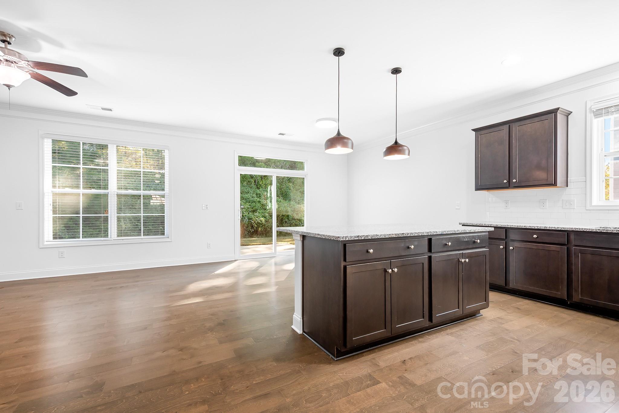 Calm lighting fills the space and you'll love your wooded view from the windows. - 3967 Lake Breeze Drive, Sherrills Ford