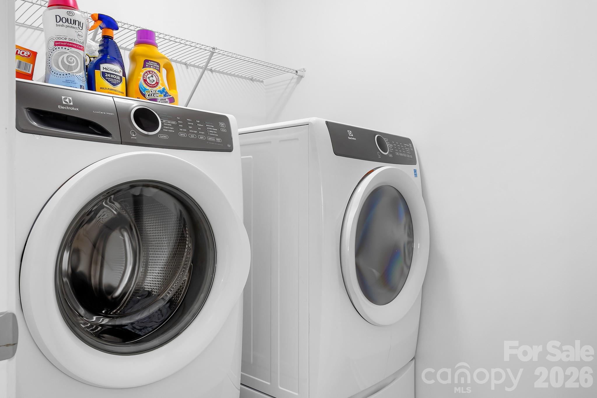 The laundry room is convenient to bedrooms upstairs. - 3967 Lake Breeze Drive, Sherrills Ford