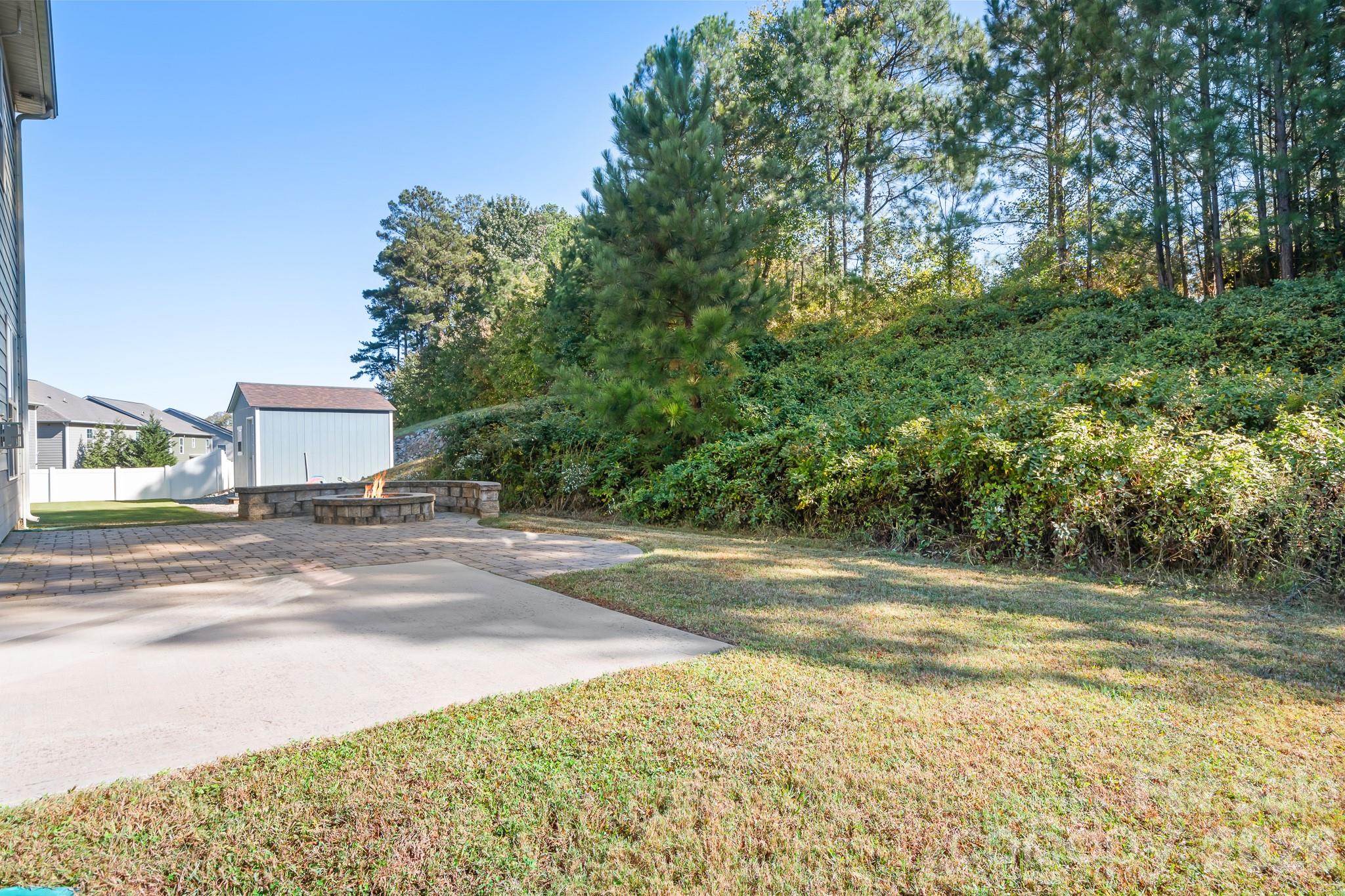 Nice, flat backyard with patio overlooking pretty whispering pines. - 3967 Lake Breeze Drive, Sherrills Ford