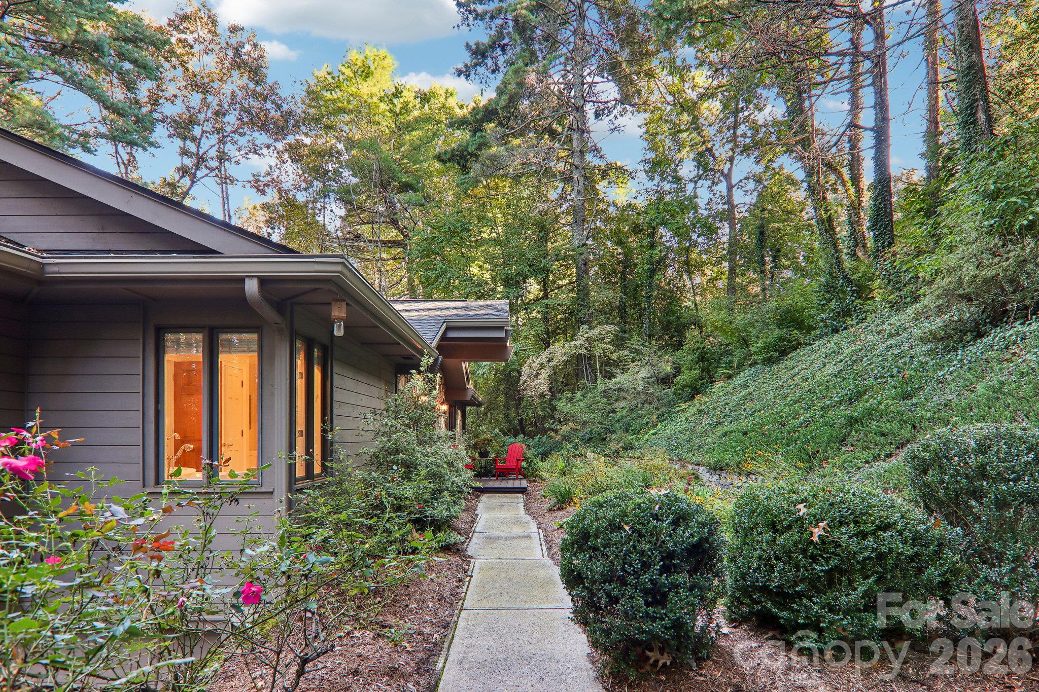 Side of home and front walkway - 212 Pheasant Run, Hendersonville