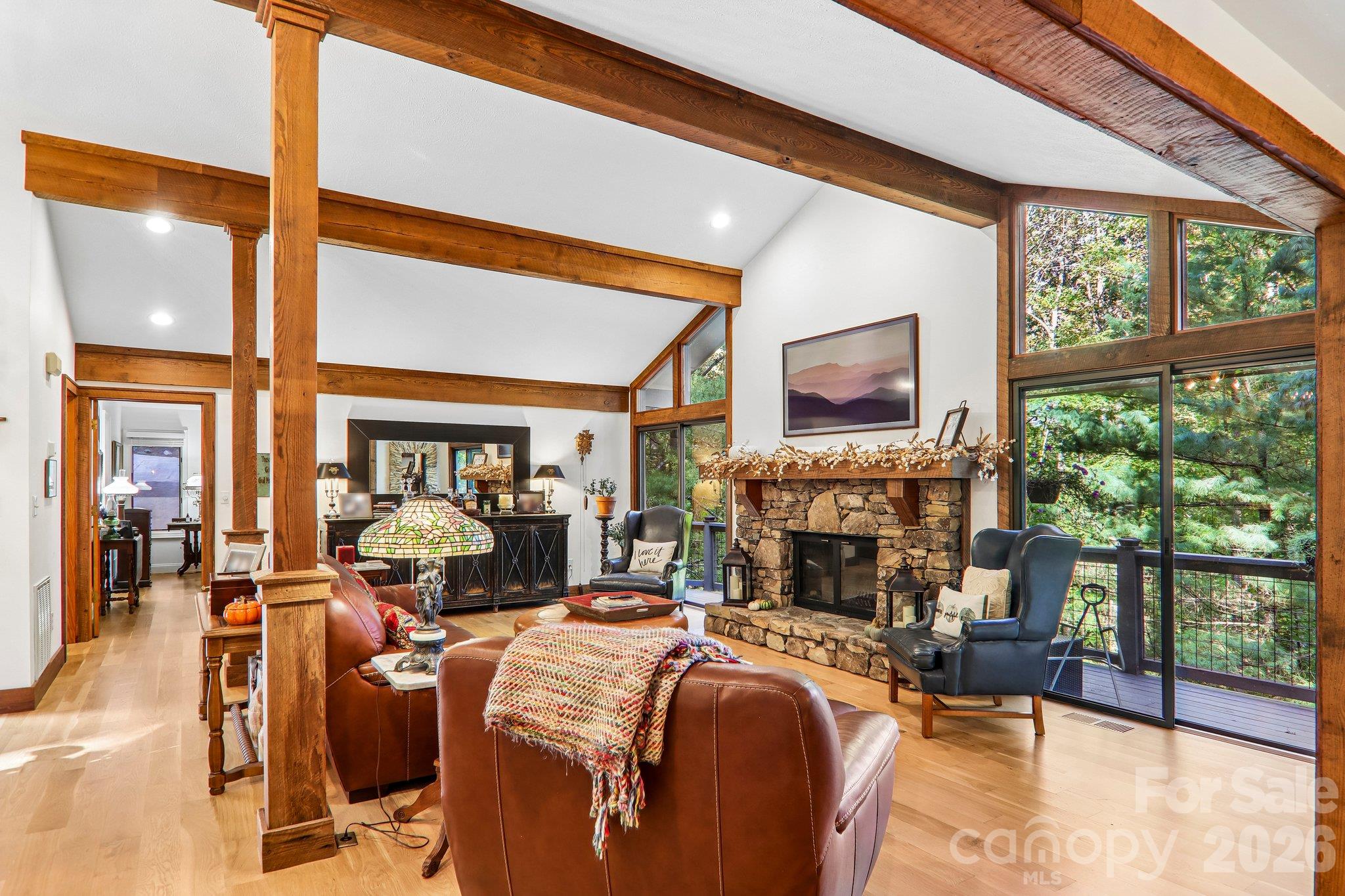 Reclaimed wood beams and trim accent the cathedral ceilings. - 212 Pheasant Run, Hendersonville