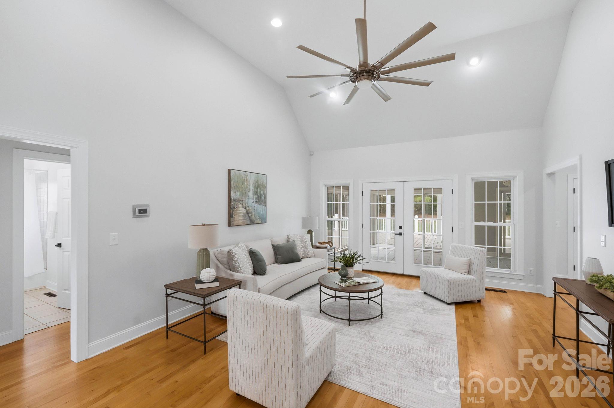 Great Room with vaulted ceilings, French doors to the sunroom - 803 Amanda Way, Albemarle