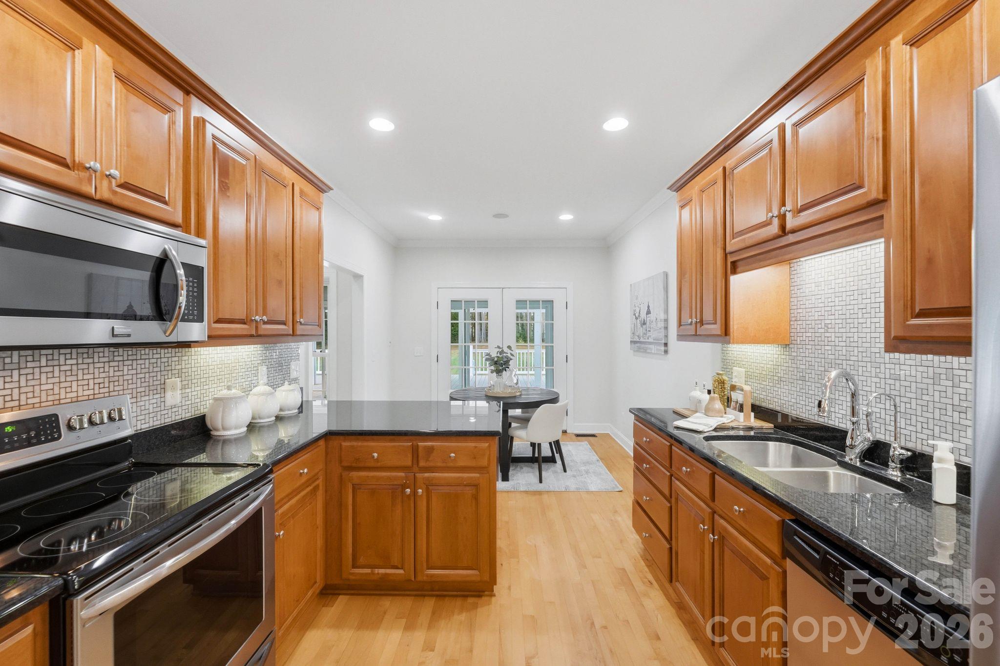 Gorgeous kitchen with granite counters, stainless steel appliances - 803 Amanda Way, Albemarle