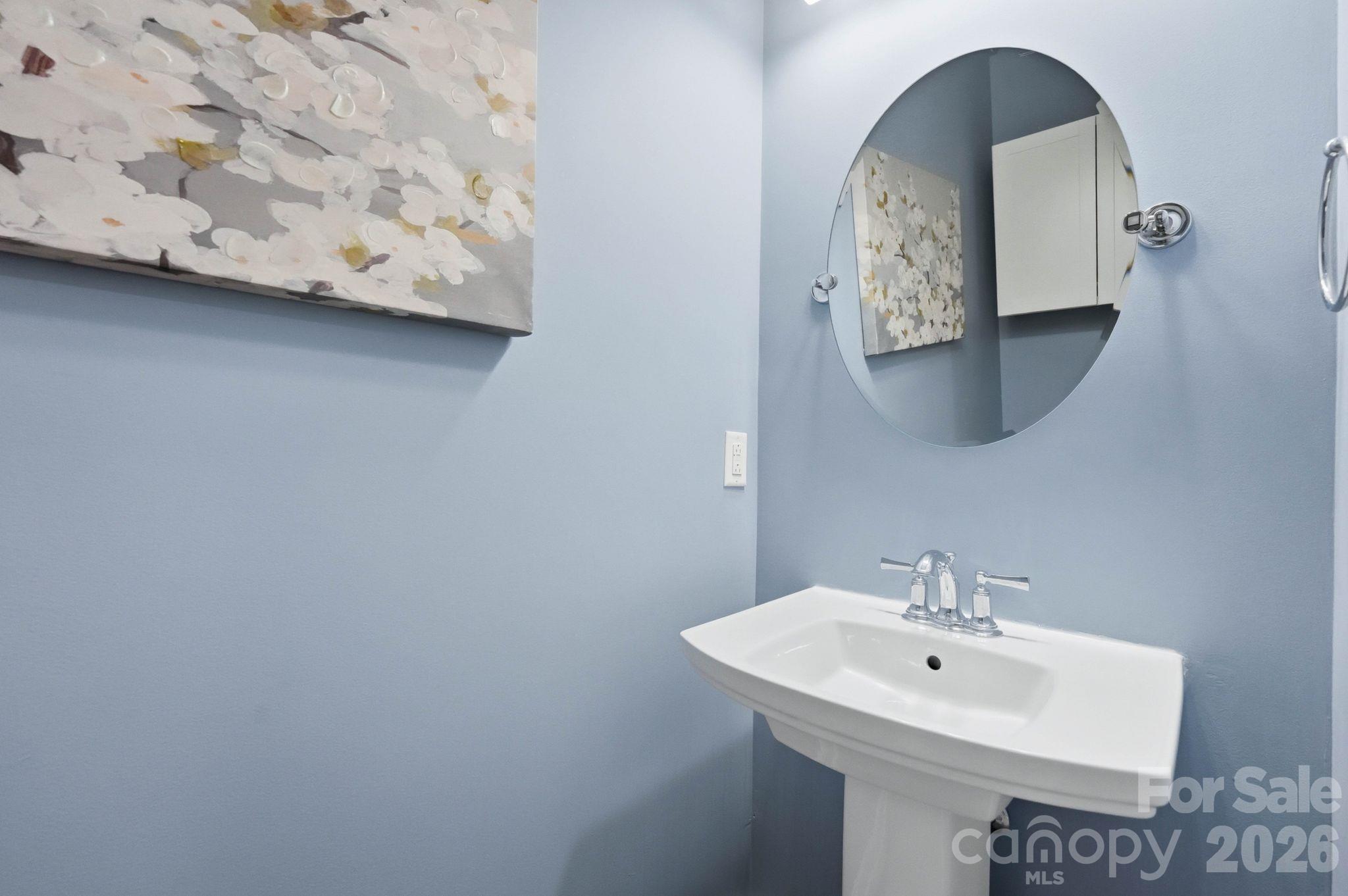 Powder bath off east hall near garage and laundry - 803 Amanda Way, Albemarle