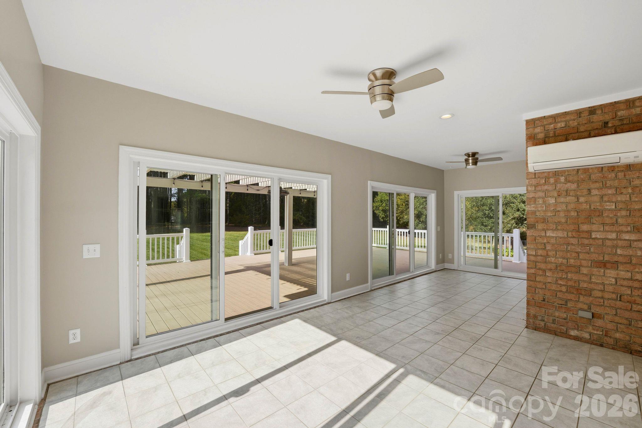 Sunroom from great room entry - 803 Amanda Way, Albemarle