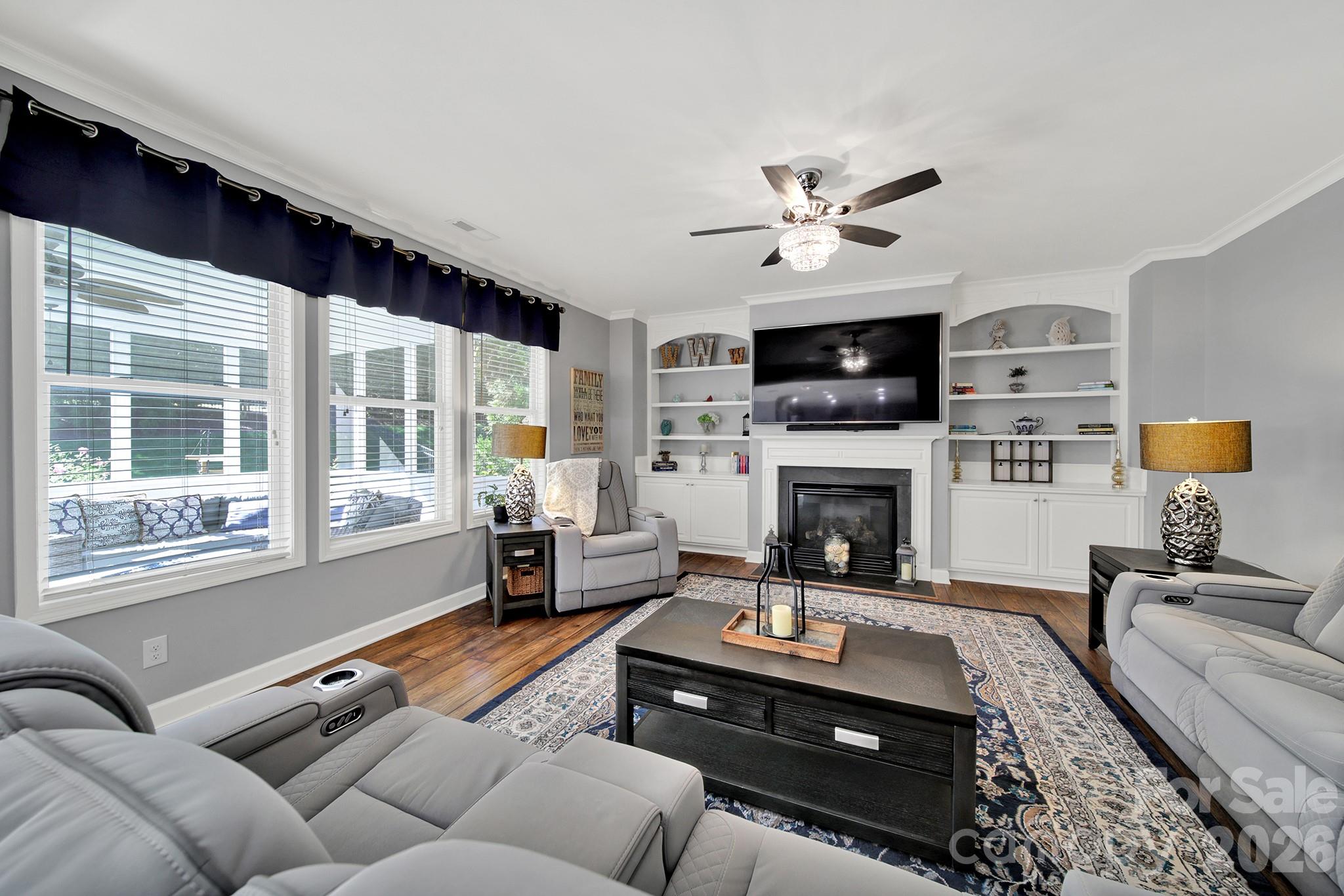 Family Room with Built-ins and Gas Fireplace - 17219 W Marbella Lane, Fort Mill