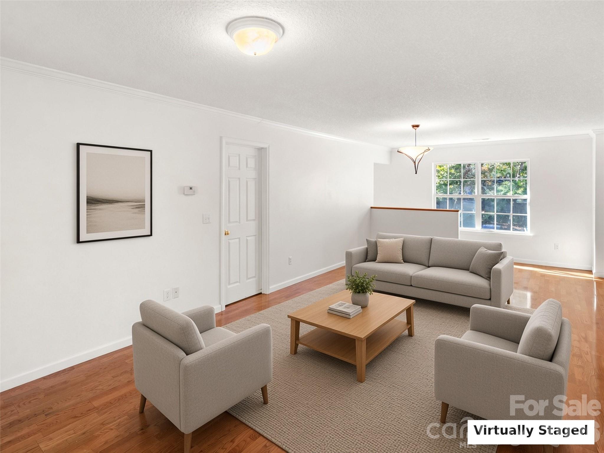 Virtually Staged. Bright living space with hardwood floors. - 206 Waters Edge Drive, Weaverville
