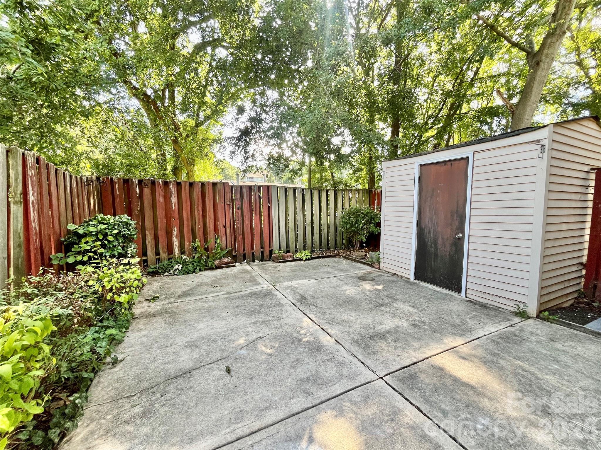 Picture prior to tenant moving in. Fence has since been replace. - 8234 Knights Bridge Road, Charlotte