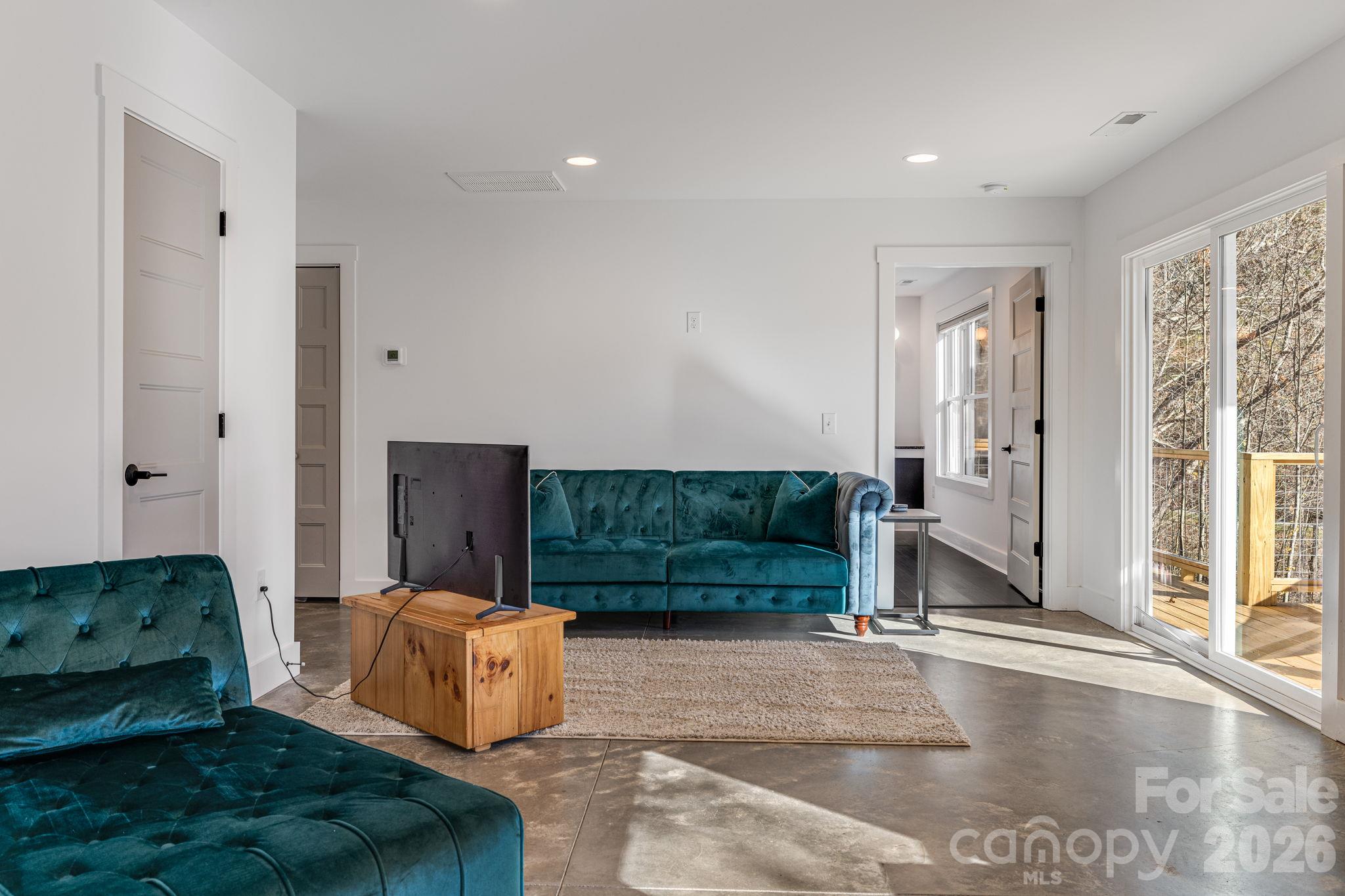 Lower Level Family Room with Sliding Doors to deck - 231 Porters Ridge, Canton