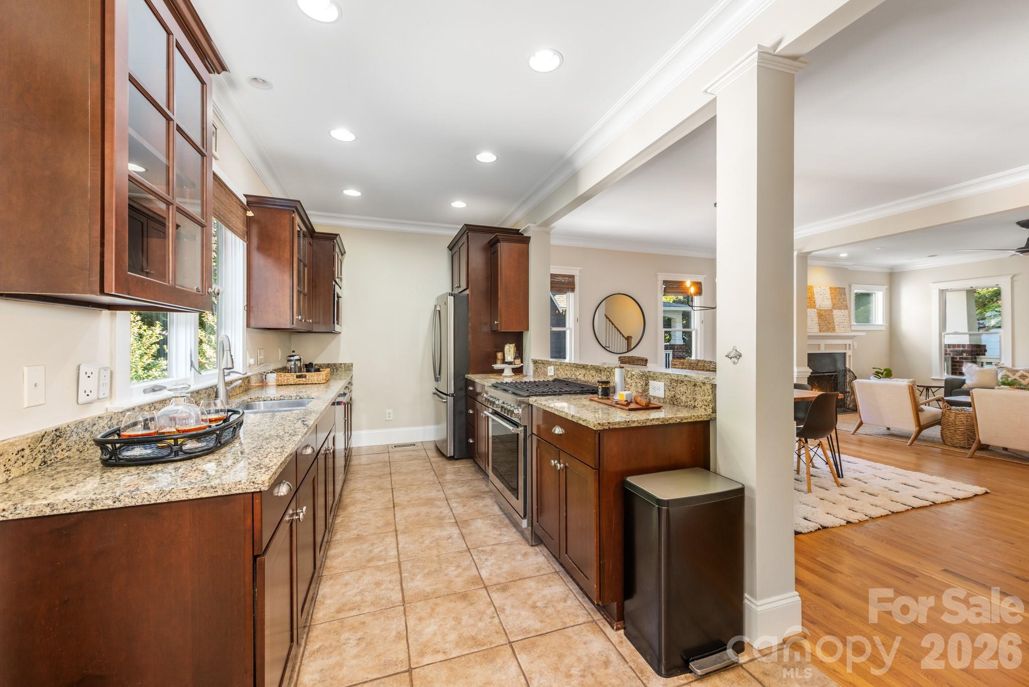 Kitchen with stainless steel appliances and a walk in pantry - 3315 Holt Street, Charlotte