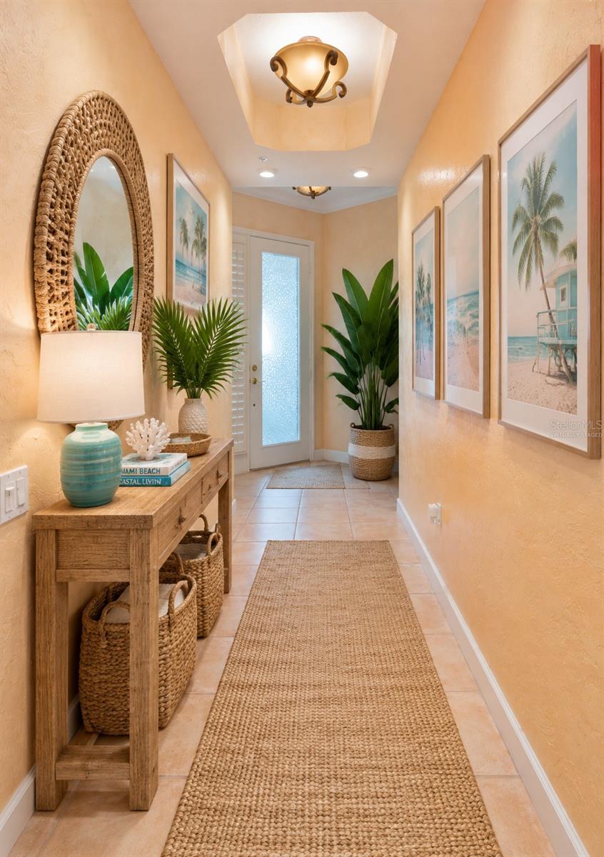 Virtually staged hallway - 7492 BOTANICA PKWY #102, SARASOTA