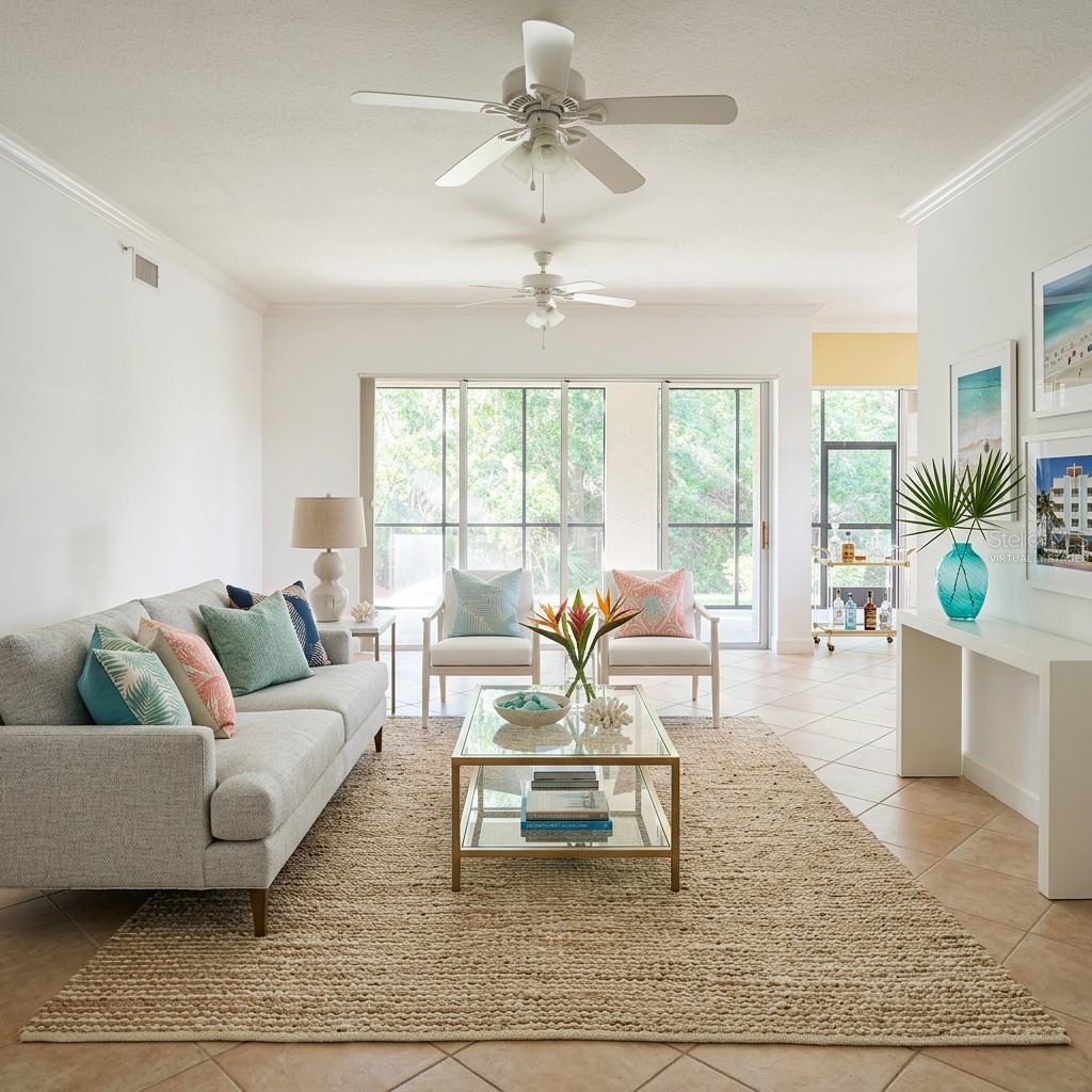 Virtually staged living room - 7492 BOTANICA PKWY #102, SARASOTA