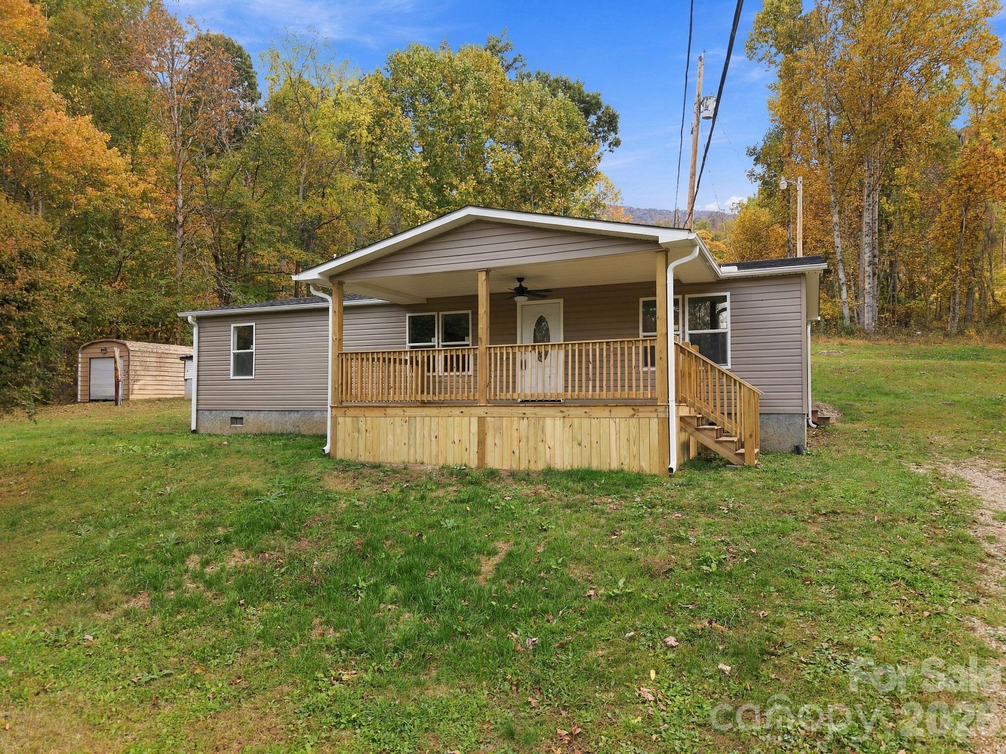 Single Family Residence at 1004 Pine Root Branch Road, Bakersville, photo 2 of 45