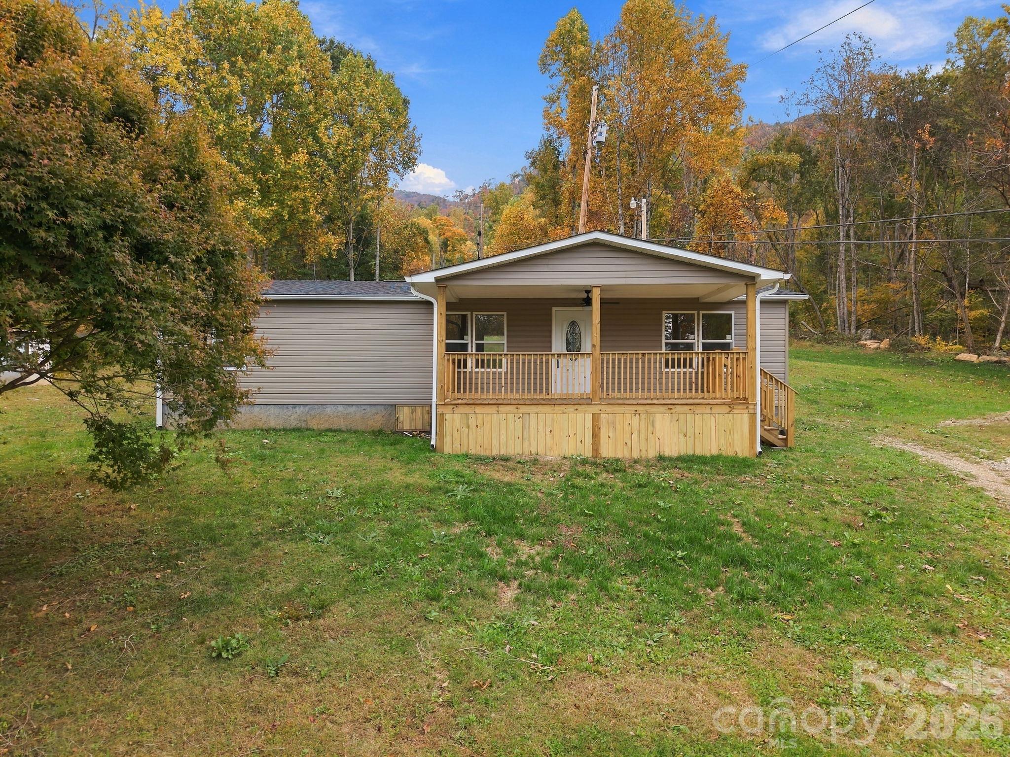 Single Family Residence at 1004 Pine Root Branch Road, Bakersville, photo 7 of 45