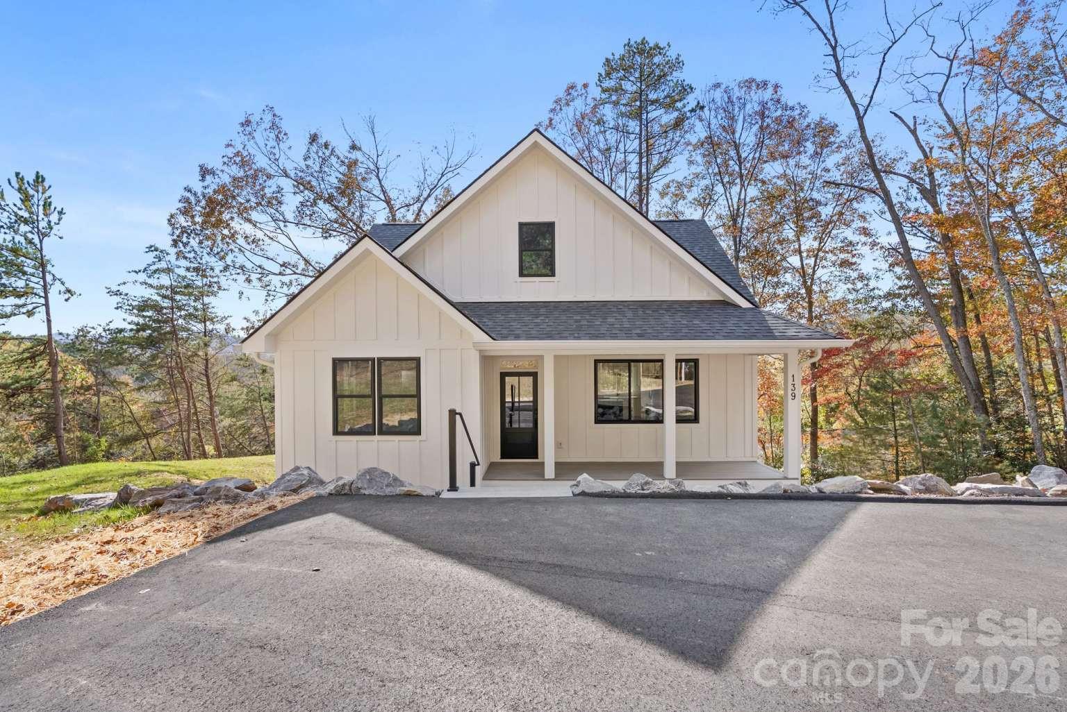 Single Family Residence at 139 Courtney Lane, Candler, photo 3 of 48