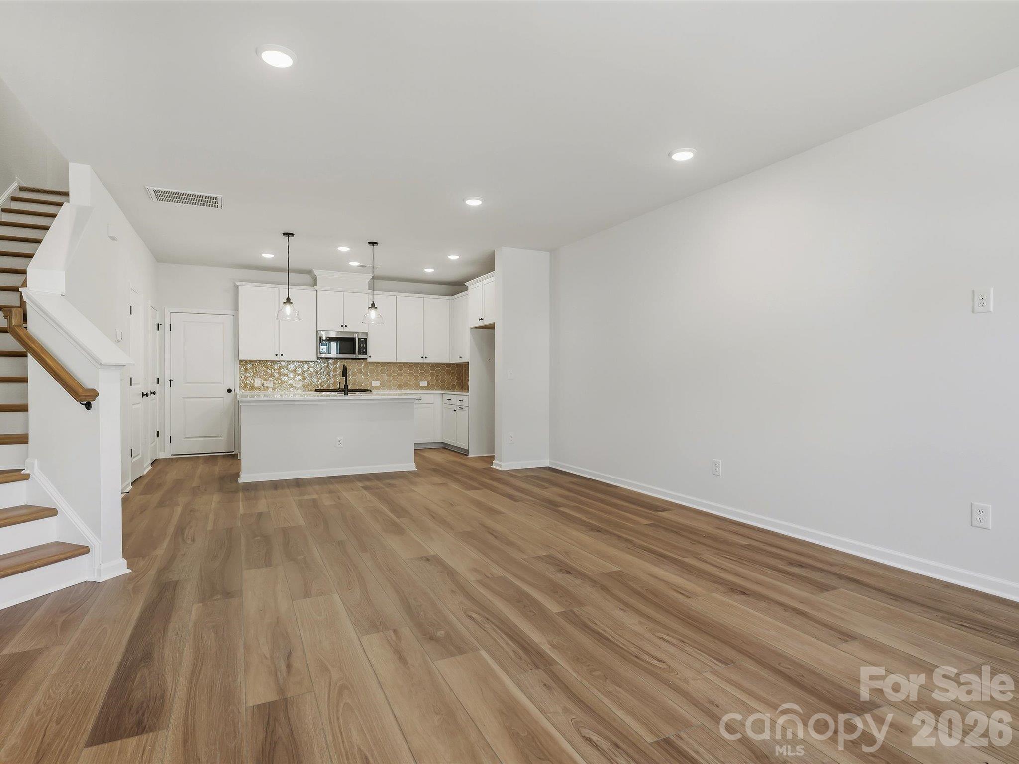 Living and dining area - 13113 Benessare Lane, Matthews