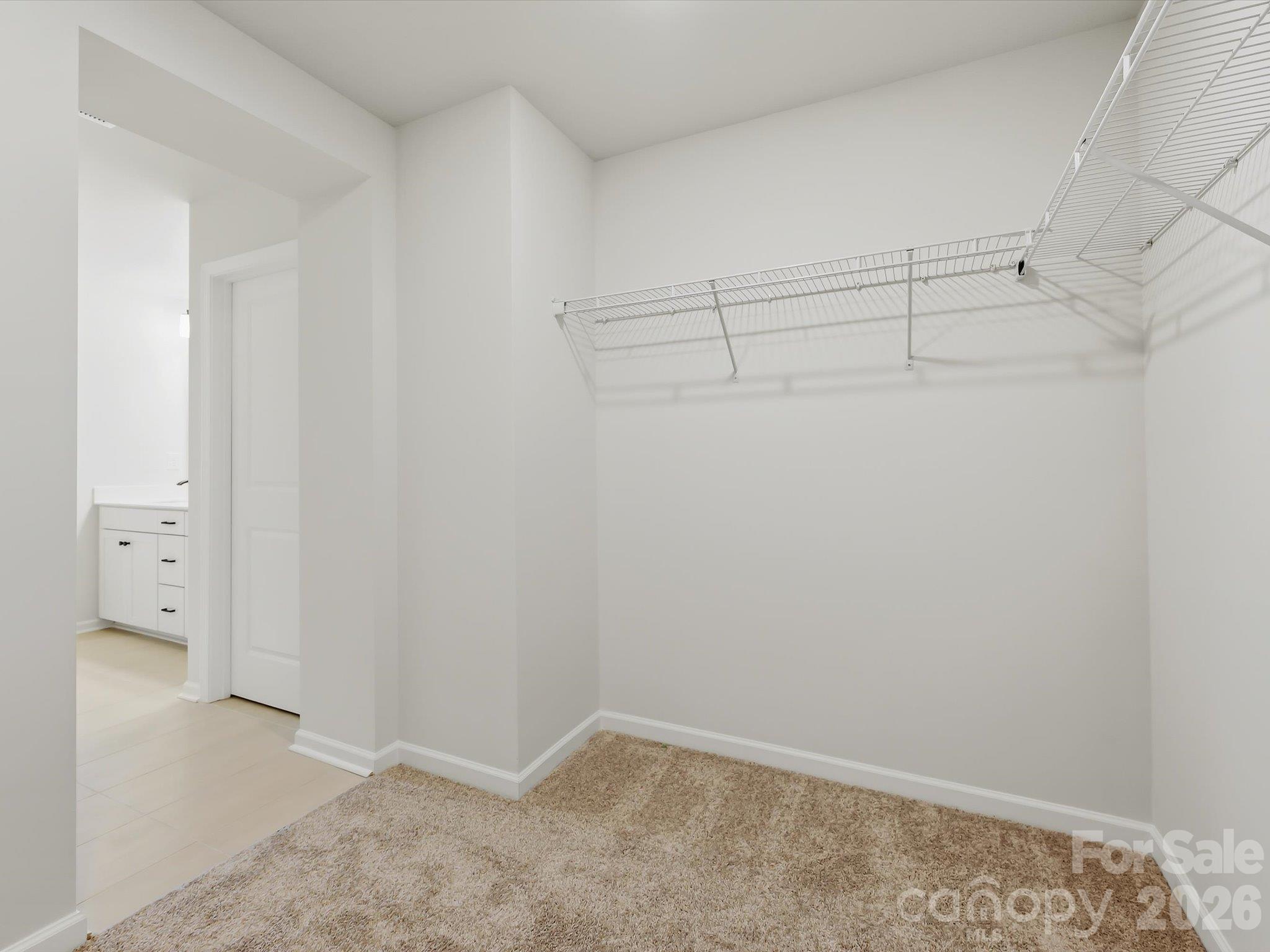 primary closet - 13113 Benessare Lane, Matthews