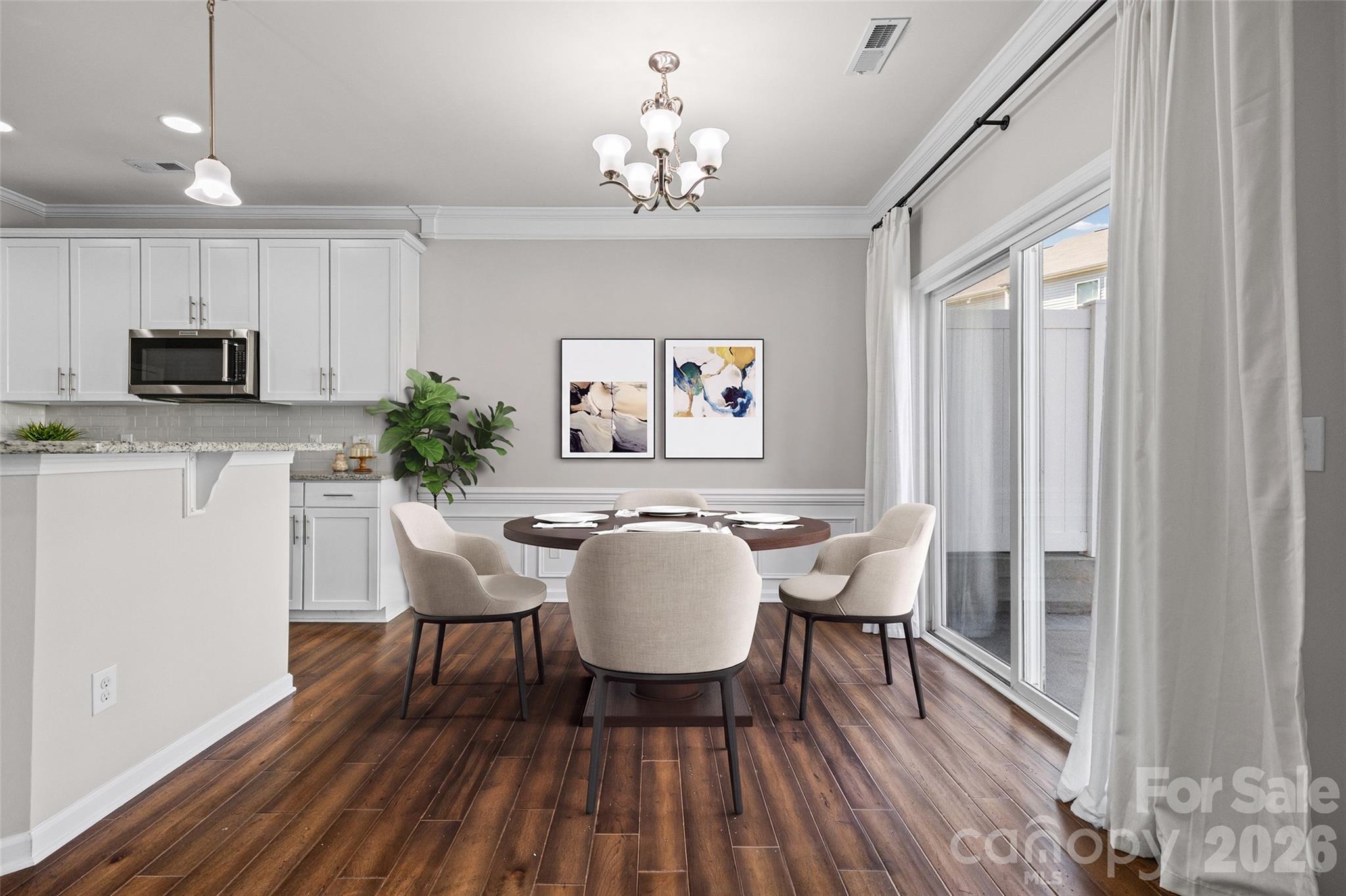 Virtually staged dining area - 6607 Portland Rose Lane, Charlotte