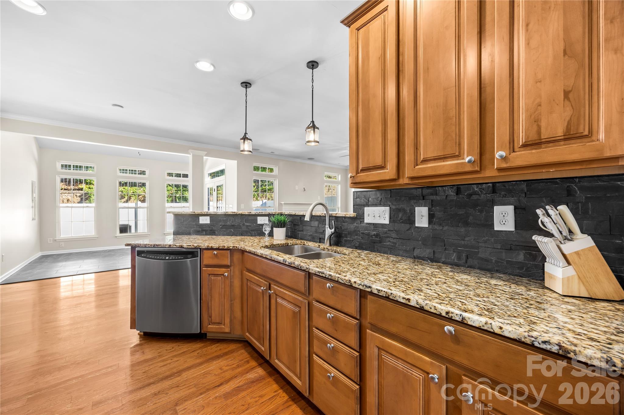 Granite, tile backsplash, and pullout shelves! - 156 N Arcadian Way, Mooresville