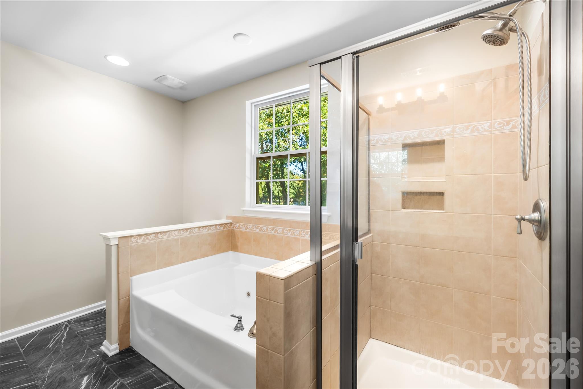 Primary has a jetted tub and tile shower - 156 N Arcadian Way, Mooresville