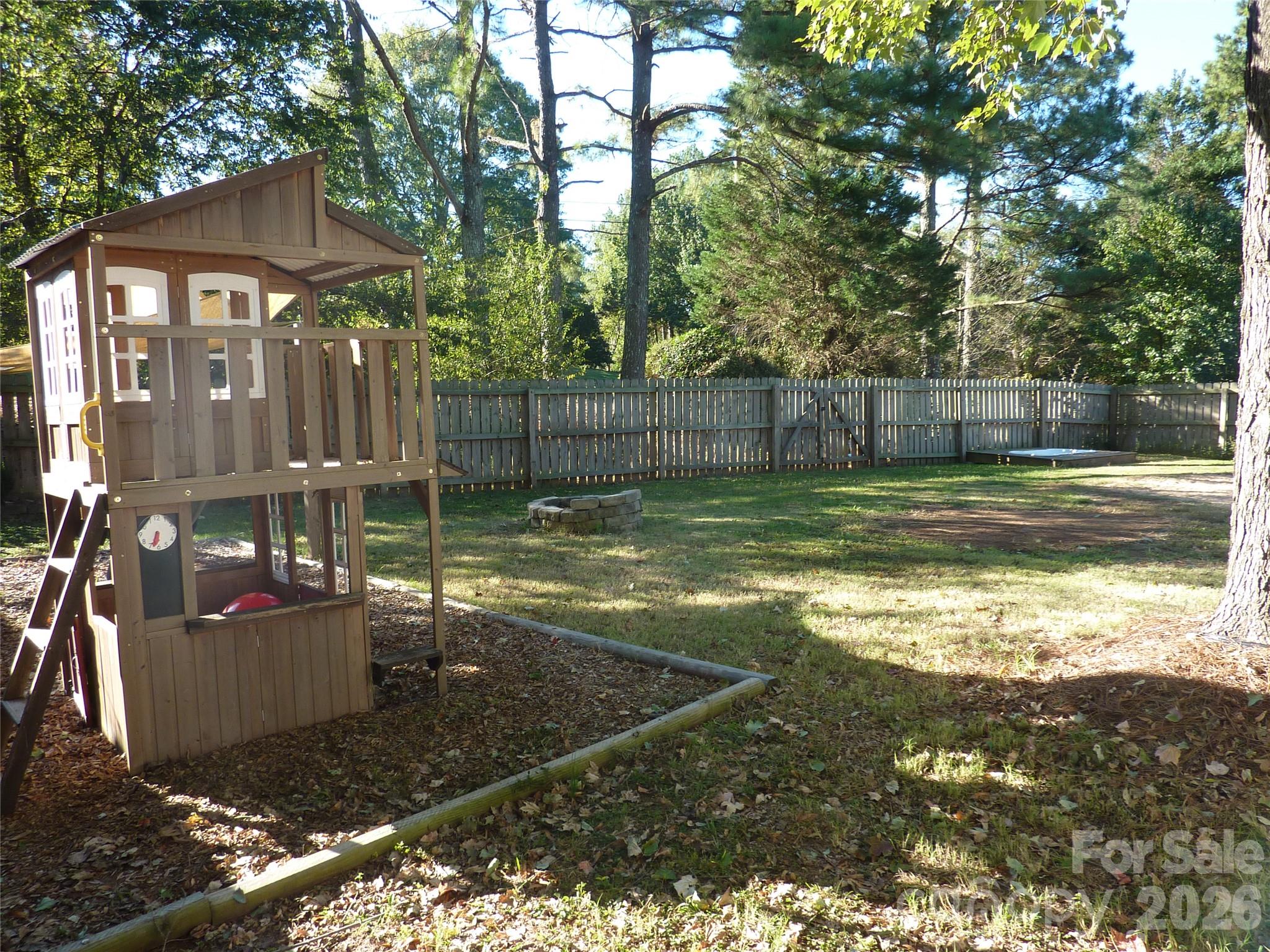 View of Large Backyard - 3716 NW Winterberry Court, Concord