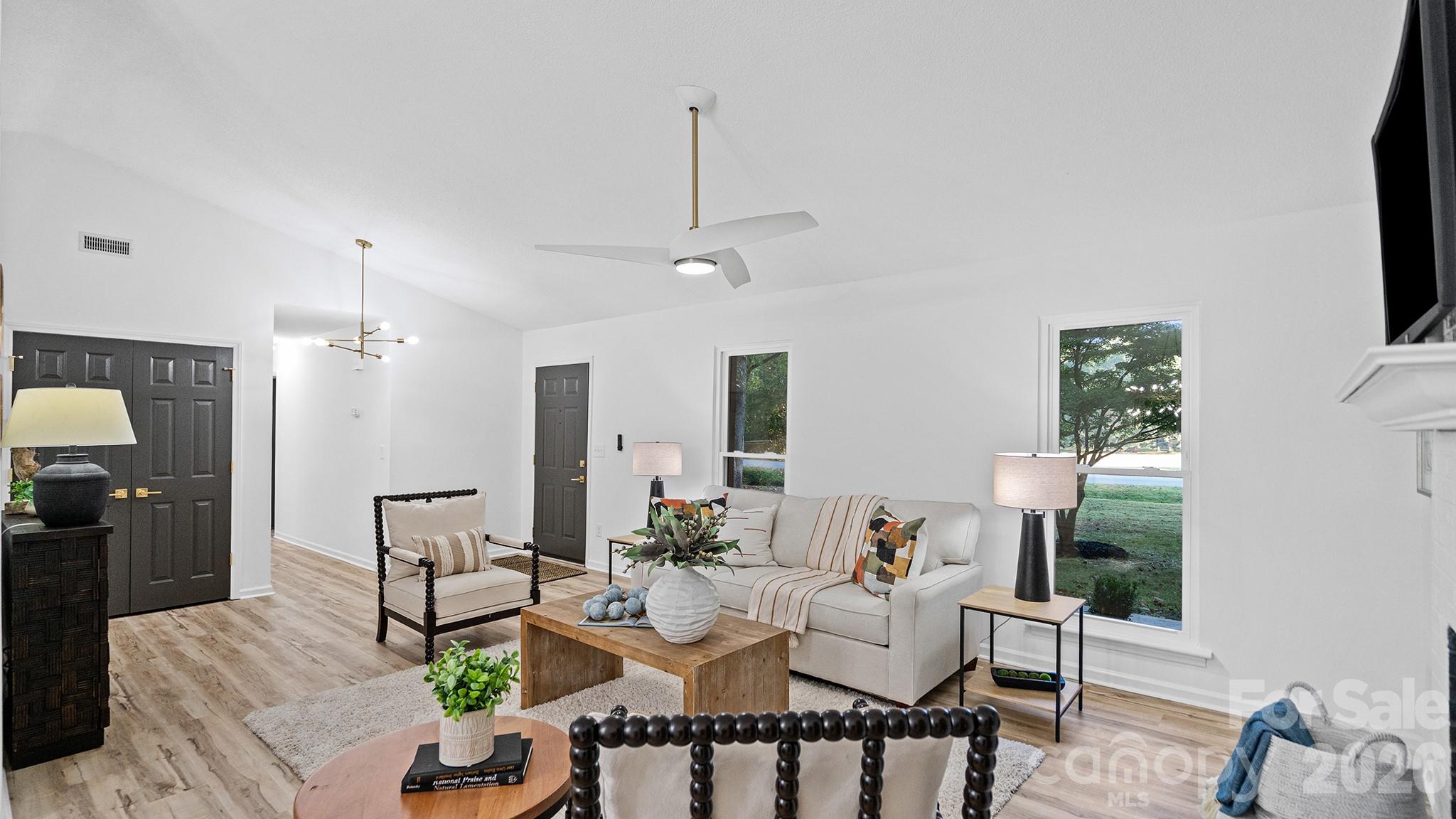 Desirable Open Layout with Vaulted Ceilings and Wood Burning Fireplace - 8001 Saddlehorse Lane, Charlotte