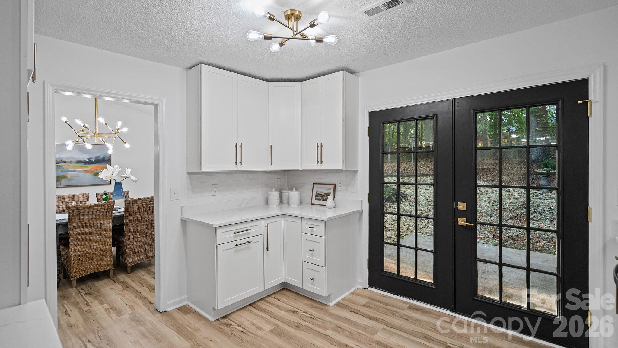 Brand New Stylish Quartz Countertops and Tile Backsplash - 8001 Saddlehorse Lane, Charlotte