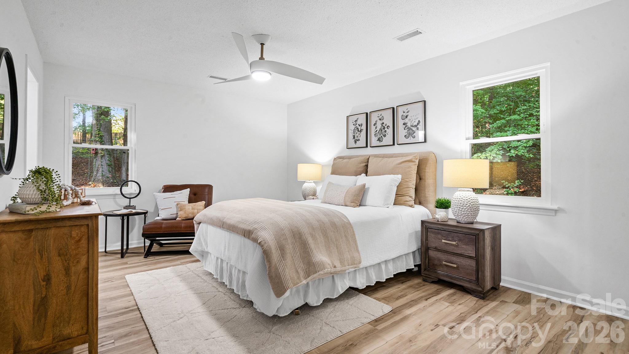 Relaxing Primary Bedroom Retreat in Rear Corner of Home for Added Privacy - 8001 Saddlehorse Lane, Charlotte